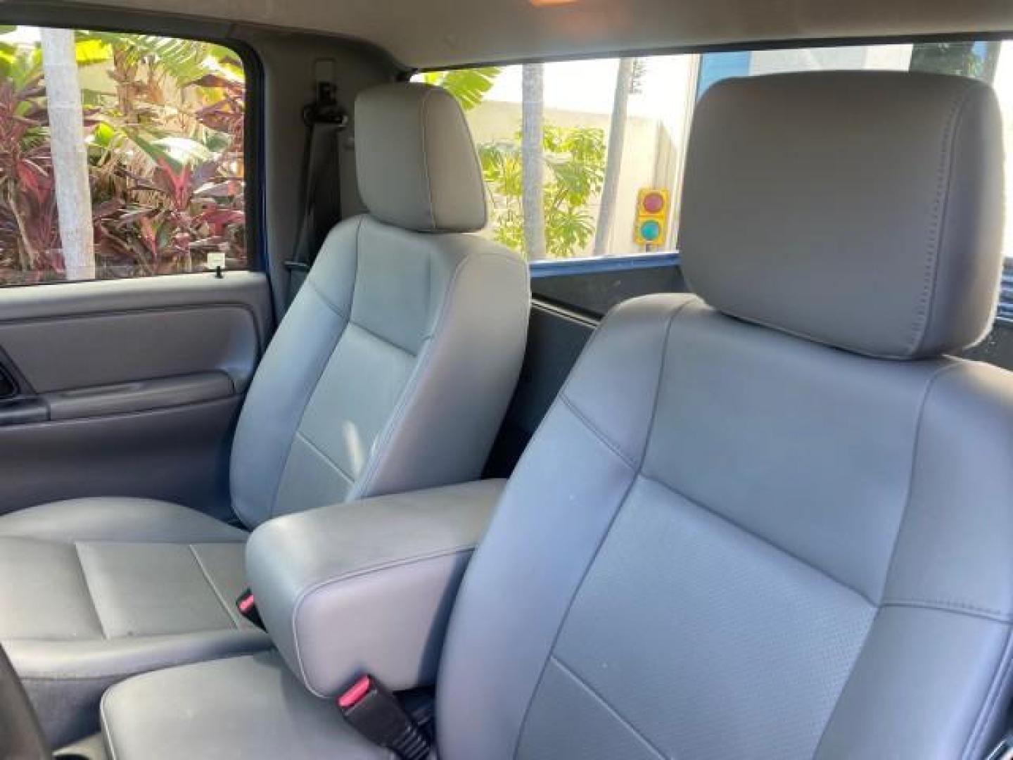 2011 Vista Blue Metallic /Medium Dark Flint Ford Ranger XL LOW MILES 22,154 1 OWNER (1FTKR1ADXBP) with an 2.3L DOHC 16-Valve I4 Engine engine, Automatic transmission, located at 4701 North Dixie Hwy, Pompano Beach, FL, 33064, (954) 422-2889, 26.240938, -80.123474 - OUR WEBPAGE FLORIDACARS1.COM HAS OVER 100 PHOTOS AND FREE CARFAX LINK 2011 FORD RANGER XL VIN: 1FTKR1ADXBPA41493 1 F T K R 1 A D X B P A 4 1 4 9 3 PICKUP 2.3L I4 F DOHC 16V GASOLINE 27 MPG REAR WHEEL DRIVE Features ABS Brakes Air Conditioning AM/FM Stereo Automatic Transmission Bed Liner Side Airbag - Photo#72