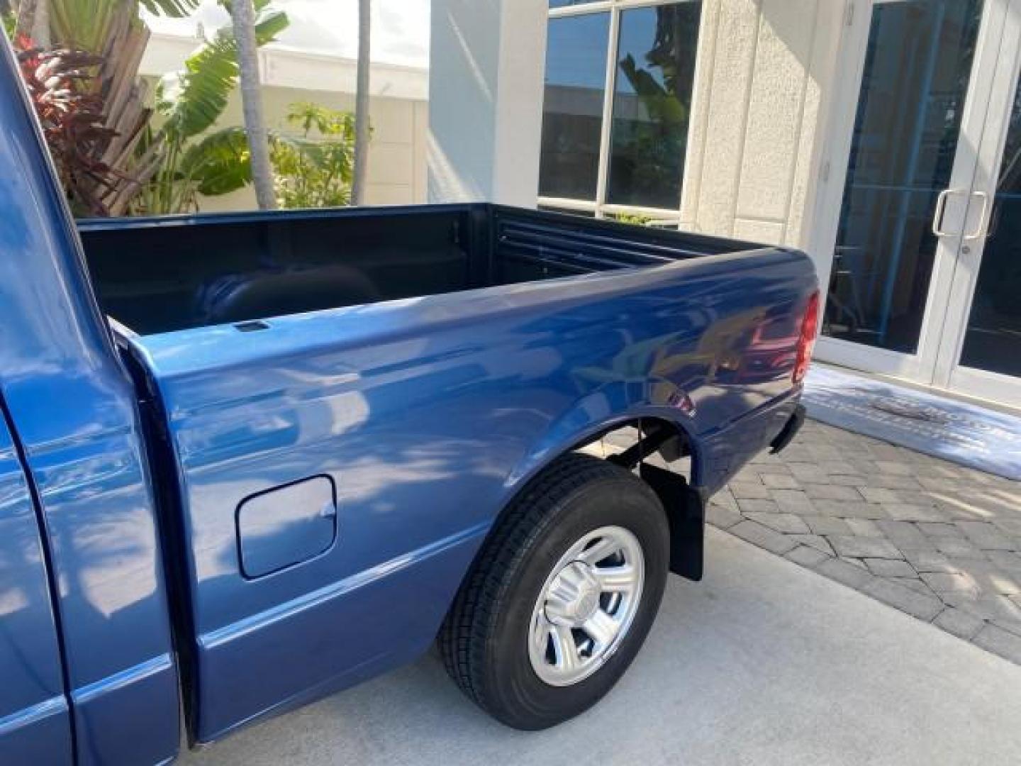 2011 Vista Blue Metallic /Medium Dark Flint Ford Ranger XL LOW MILES 22,154 1 OWNER (1FTKR1ADXBP) with an 2.3L DOHC 16-Valve I4 Engine engine, Automatic transmission, located at 4701 North Dixie Hwy, Pompano Beach, FL, 33064, (954) 422-2889, 26.240938, -80.123474 - OUR WEBPAGE FLORIDACARS1.COM HAS OVER 100 PHOTOS AND FREE CARFAX LINK 2011 FORD RANGER XL VIN: 1FTKR1ADXBPA41493 1 F T K R 1 A D X B P A 4 1 4 9 3 PICKUP 2.3L I4 F DOHC 16V GASOLINE 27 MPG REAR WHEEL DRIVE Features ABS Brakes Air Conditioning AM/FM Stereo Automatic Transmission Bed Liner Side Airbag - Photo#75