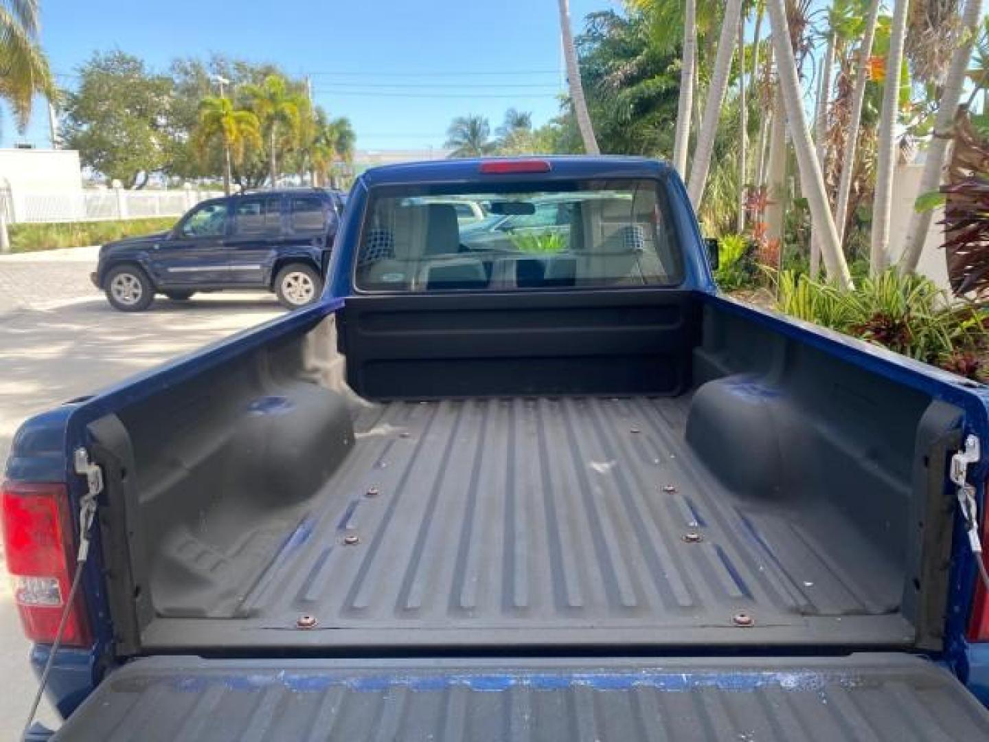 2011 Vista Blue Metallic /Medium Dark Flint Ford Ranger XL LOW MILES 22,154 1 OWNER (1FTKR1ADXBP) with an 2.3L DOHC 16-Valve I4 Engine engine, Automatic transmission, located at 4701 North Dixie Hwy, Pompano Beach, FL, 33064, (954) 422-2889, 26.240938, -80.123474 - OUR WEBPAGE FLORIDACARS1.COM HAS OVER 100 PHOTOS AND FREE CARFAX LINK 2011 FORD RANGER XL VIN: 1FTKR1ADXBPA41493 1 F T K R 1 A D X B P A 4 1 4 9 3 PICKUP 2.3L I4 F DOHC 16V GASOLINE 27 MPG REAR WHEEL DRIVE Features ABS Brakes Air Conditioning AM/FM Stereo Automatic Transmission Bed Liner Side Airbag - Photo#95