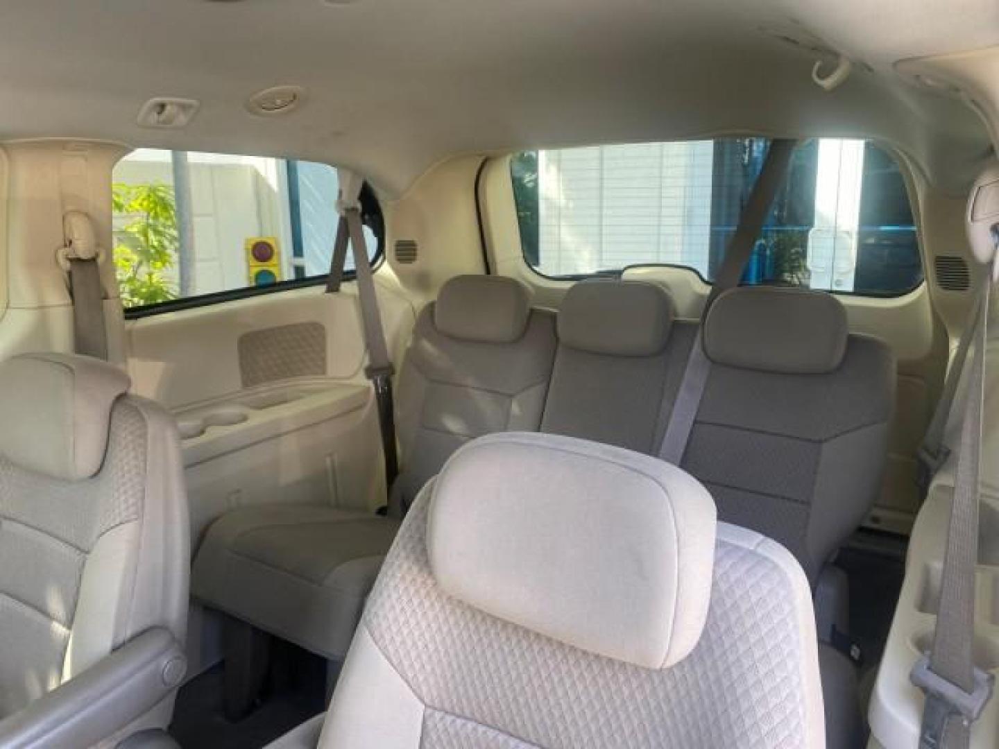 2010 Clearwater Blue Pearl /Medium pebble beige/cream Chrysler Town and Country LXI LOW MILES 77705 FL (2A4RR4DE6AR) with an 3.3L OHV SMPI V6 Engine engine, Automatic transmission, located at 4701 North Dixie Hwy, Pompano Beach, FL, 33064, (954) 422-2889, 26.240938, -80.123474 - OUR WEBPAGE FLORIDACARS1.COM HAS OVER 100 PHOTOS AND FREE CARFAX LINK 2010 CHRYSLER TOWN AND COUNTRY LXI VIN: 2A4RR4DE6AR116900 2 A 4 R R 4 D E 6 A R 1 1 6 9 0 0 VAN 3.3L V6 F OHV 12V GASOLINE 24 MPG FRONT WHEEL DRIVE Features ABS Brakes Air Conditioning AM/FM Stereo Automatic Transmission Auxiliary - Photo#77
