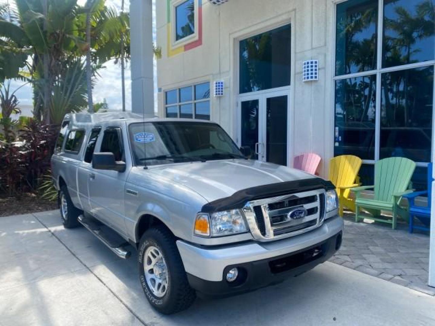 2011 Silver Metallic /Medium Dark Flint Ford Ranger XLT LOW MILES 69,782 4WD (1FTLR4FEXBP) with an 4.0L SOHC V6 Engine engine, Automatic transmission, located at 4701 North Dixie Hwy, Pompano Beach, FL, 33064, (954) 422-2889, 26.240938, -80.123474 - OUR WEBPAGE FLORIDACARS1.COM HAS OVER 100 PHOTOS AND FREE CARFAX LINK 2011 FORD RANGER XLT 4 DOOR 4 WHEEL DRIVE LEER CAMPER TOP FIBER GLASS ICE COLD A/C VIN: 1FTLR4FEXBPA23552 1 F T L R 4 F E X B P A 2 3 5 5 2 4 DOOR EXTENDED CAB PICKUP 4.0L V6 F SOHC 16V GASOLINE 19 MPG REAR WHEEL DRIVE W/ 4X4 Feat - Photo#1