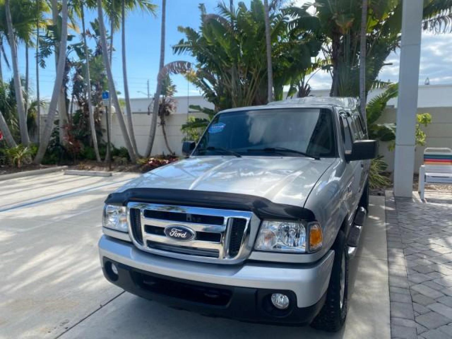 2011 Silver Metallic /Medium Dark Flint Ford Ranger XLT LOW MILES 69,782 4WD (1FTLR4FEXBP) with an 4.0L SOHC V6 Engine engine, Automatic transmission, located at 4701 North Dixie Hwy, Pompano Beach, FL, 33064, (954) 422-2889, 26.240938, -80.123474 - OUR WEBPAGE FLORIDACARS1.COM HAS OVER 100 PHOTOS AND FREE CARFAX LINK 2011 FORD RANGER XLT 4 DOOR 4 WHEEL DRIVE LEER CAMPER TOP FIBER GLASS ICE COLD A/C VIN: 1FTLR4FEXBPA23552 1 F T L R 4 F E X B P A 2 3 5 5 2 4 DOOR EXTENDED CAB PICKUP 4.0L V6 F SOHC 16V GASOLINE 19 MPG REAR WHEEL DRIVE W/ 4X4 Feat - Photo#3