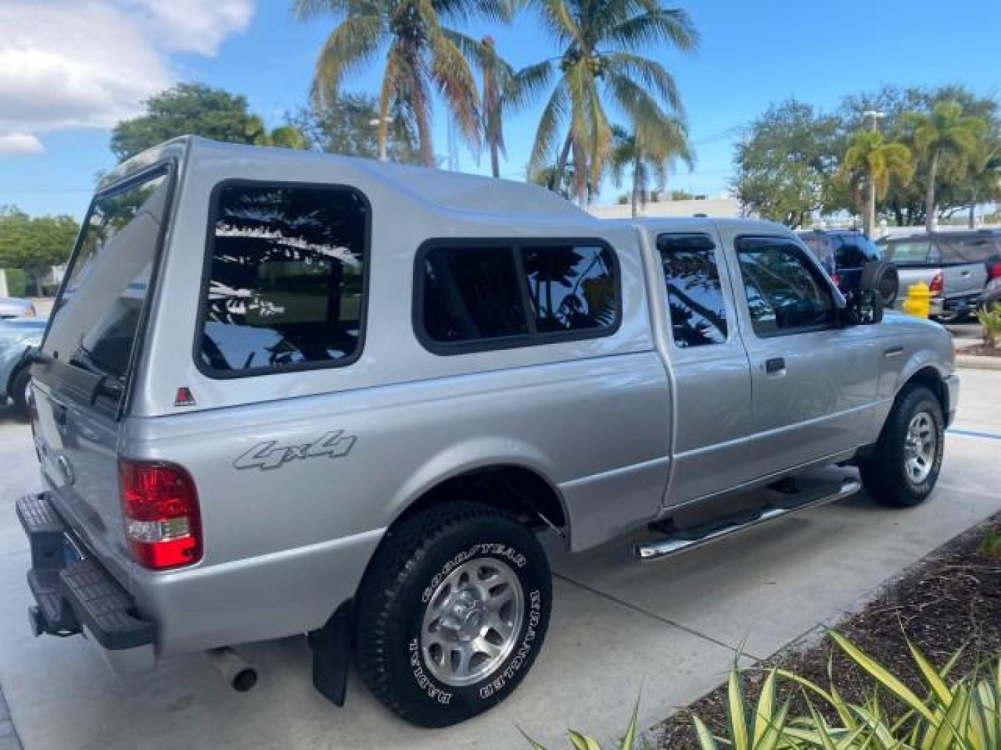 2011 Silver Metallic /Medium Dark Flint Ford Ranger XLT LOW MILES 69,782 4WD (1FTLR4FEXBP) with an 4.0L SOHC V6 Engine engine, Automatic transmission, located at 4701 North Dixie Hwy, Pompano Beach, FL, 33064, (954) 422-2889, 26.240938, -80.123474 - OUR WEBPAGE FLORIDACARS1.COM HAS OVER 100 PHOTOS AND FREE CARFAX LINK 2011 FORD RANGER XLT 4 DOOR 4 WHEEL DRIVE LEER CAMPER TOP FIBER GLASS ICE COLD A/C VIN: 1FTLR4FEXBPA23552 1 F T L R 4 F E X B P A 2 3 5 5 2 4 DOOR EXTENDED CAB PICKUP 4.0L V6 F SOHC 16V GASOLINE 19 MPG REAR WHEEL DRIVE W/ 4X4 Feat - Photo#7