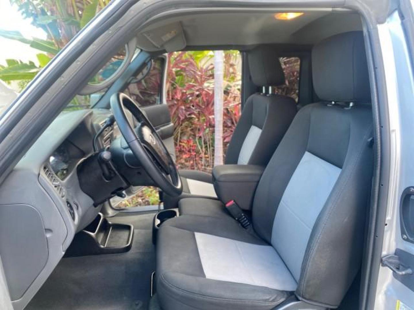 2011 Silver Metallic /Medium Dark Flint Ford Ranger XLT LOW MILES 69,782 4WD (1FTLR4FEXBP) with an 4.0L SOHC V6 Engine engine, Automatic transmission, located at 4701 North Dixie Hwy, Pompano Beach, FL, 33064, (954) 422-2889, 26.240938, -80.123474 - OUR WEBPAGE FLORIDACARS1.COM HAS OVER 100 PHOTOS AND FREE CARFAX LINK 2011 FORD RANGER XLT 4 DOOR 4 WHEEL DRIVE LEER CAMPER TOP FIBER GLASS ICE COLD A/C VIN: 1FTLR4FEXBPA23552 1 F T L R 4 F E X B P A 2 3 5 5 2 4 DOOR EXTENDED CAB PICKUP 4.0L V6 F SOHC 16V GASOLINE 19 MPG REAR WHEEL DRIVE W/ 4X4 Feat - Photo#10