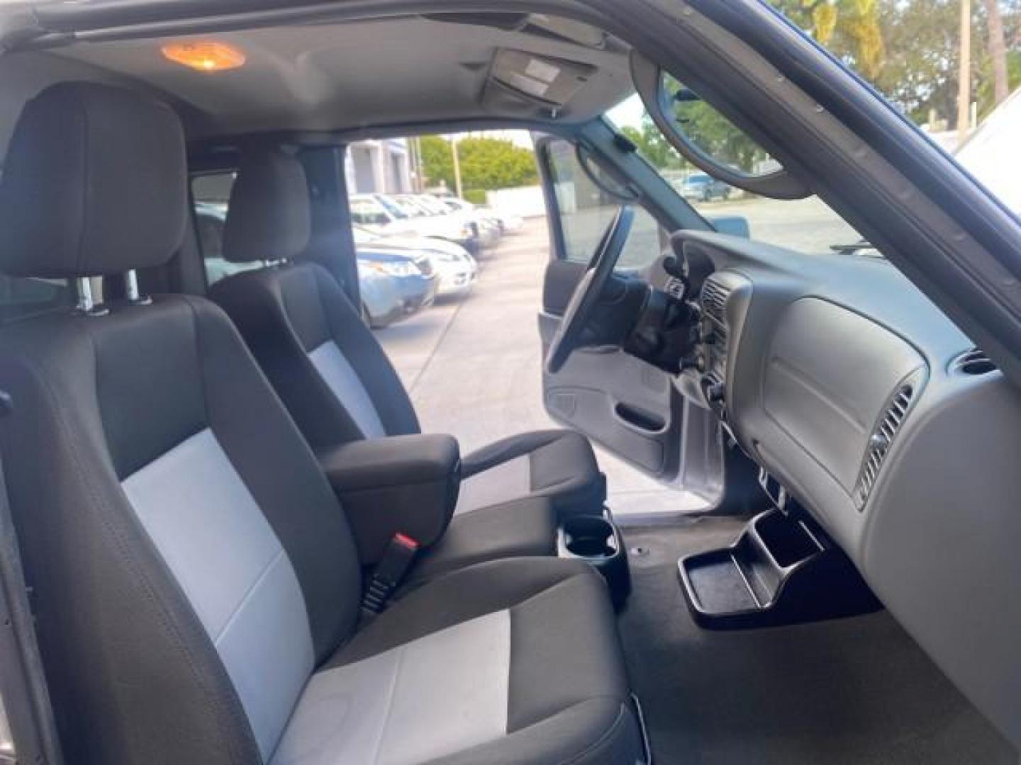 2011 Silver Metallic /Medium Dark Flint Ford Ranger XLT LOW MILES 69,782 4WD (1FTLR4FEXBP) with an 4.0L SOHC V6 Engine engine, Automatic transmission, located at 4701 North Dixie Hwy, Pompano Beach, FL, 33064, (954) 422-2889, 26.240938, -80.123474 - OUR WEBPAGE FLORIDACARS1.COM HAS OVER 100 PHOTOS AND FREE CARFAX LINK 2011 FORD RANGER XLT 4 DOOR 4 WHEEL DRIVE LEER CAMPER TOP FIBER GLASS ICE COLD A/C VIN: 1FTLR4FEXBPA23552 1 F T L R 4 F E X B P A 2 3 5 5 2 4 DOOR EXTENDED CAB PICKUP 4.0L V6 F SOHC 16V GASOLINE 19 MPG REAR WHEEL DRIVE W/ 4X4 Feat - Photo#12