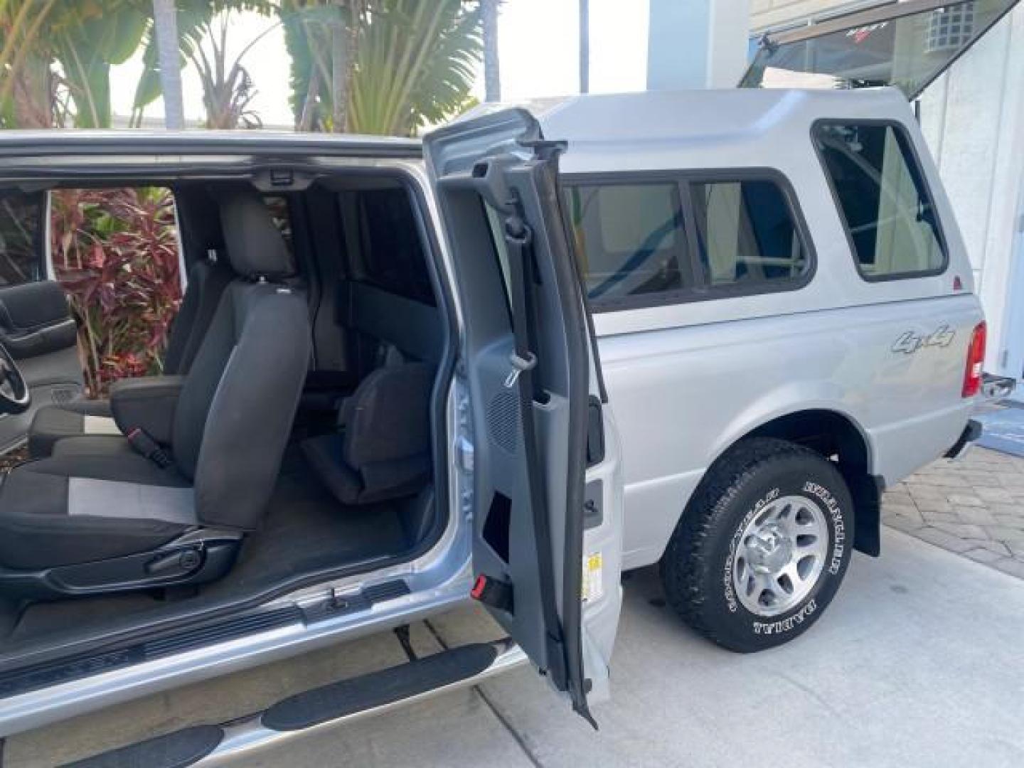 2011 Silver Metallic /Medium Dark Flint Ford Ranger XLT LOW MILES 69,782 4WD (1FTLR4FEXBP) with an 4.0L SOHC V6 Engine engine, Automatic transmission, located at 4701 North Dixie Hwy, Pompano Beach, FL, 33064, (954) 422-2889, 26.240938, -80.123474 - OUR WEBPAGE FLORIDACARS1.COM HAS OVER 100 PHOTOS AND FREE CARFAX LINK 2011 FORD RANGER XLT 4 DOOR 4 WHEEL DRIVE LEER CAMPER TOP FIBER GLASS ICE COLD A/C VIN: 1FTLR4FEXBPA23552 1 F T L R 4 F E X B P A 2 3 5 5 2 4 DOOR EXTENDED CAB PICKUP 4.0L V6 F SOHC 16V GASOLINE 19 MPG REAR WHEEL DRIVE W/ 4X4 Feat - Photo#13