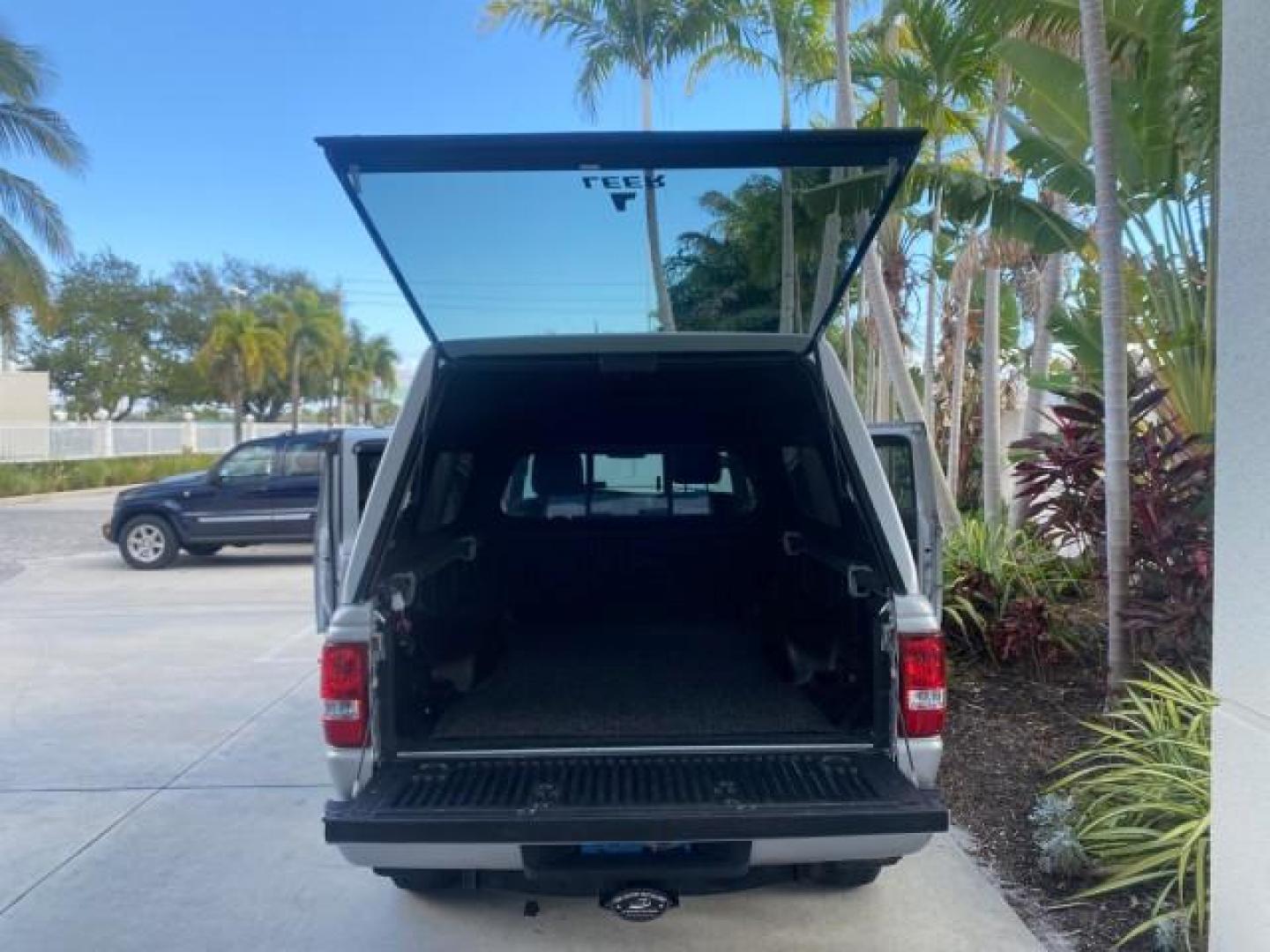 2011 Silver Metallic /Medium Dark Flint Ford Ranger XLT LOW MILES 69,782 4WD (1FTLR4FEXBP) with an 4.0L SOHC V6 Engine engine, Automatic transmission, located at 4701 North Dixie Hwy, Pompano Beach, FL, 33064, (954) 422-2889, 26.240938, -80.123474 - OUR WEBPAGE FLORIDACARS1.COM HAS OVER 100 PHOTOS AND FREE CARFAX LINK 2011 FORD RANGER XLT 4 DOOR 4 WHEEL DRIVE LEER CAMPER TOP FIBER GLASS ICE COLD A/C VIN: 1FTLR4FEXBPA23552 1 F T L R 4 F E X B P A 2 3 5 5 2 4 DOOR EXTENDED CAB PICKUP 4.0L V6 F SOHC 16V GASOLINE 19 MPG REAR WHEEL DRIVE W/ 4X4 Feat - Photo#15