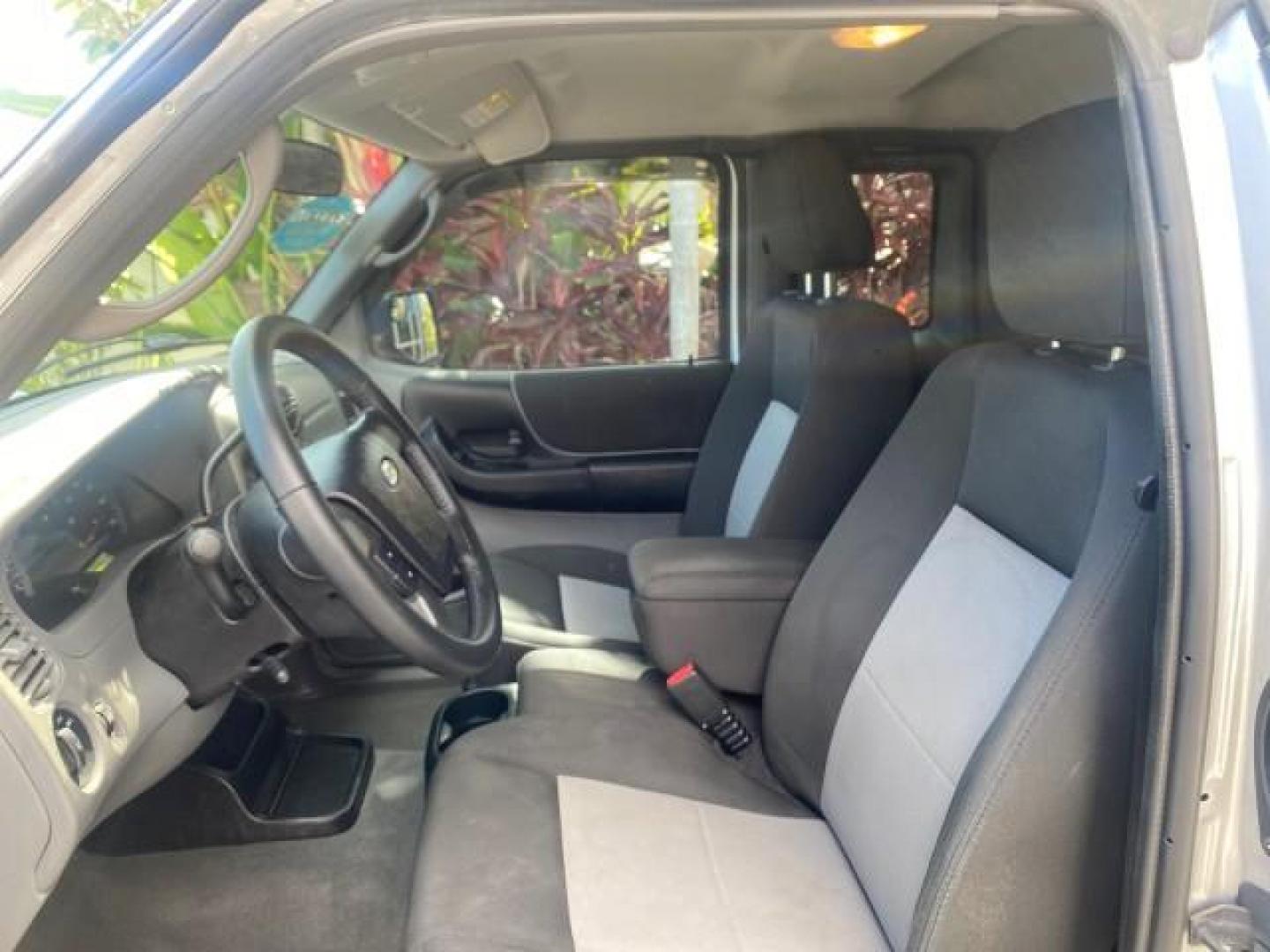2011 Silver Metallic /Medium Dark Flint Ford Ranger XLT LOW MILES 69,782 4WD (1FTLR4FEXBP) with an 4.0L SOHC V6 Engine engine, Automatic transmission, located at 4701 North Dixie Hwy, Pompano Beach, FL, 33064, (954) 422-2889, 26.240938, -80.123474 - OUR WEBPAGE FLORIDACARS1.COM HAS OVER 100 PHOTOS AND FREE CARFAX LINK 2011 FORD RANGER XLT 4 DOOR 4 WHEEL DRIVE LEER CAMPER TOP FIBER GLASS ICE COLD A/C VIN: 1FTLR4FEXBPA23552 1 F T L R 4 F E X B P A 2 3 5 5 2 4 DOOR EXTENDED CAB PICKUP 4.0L V6 F SOHC 16V GASOLINE 19 MPG REAR WHEEL DRIVE W/ 4X4 Feat - Photo#46