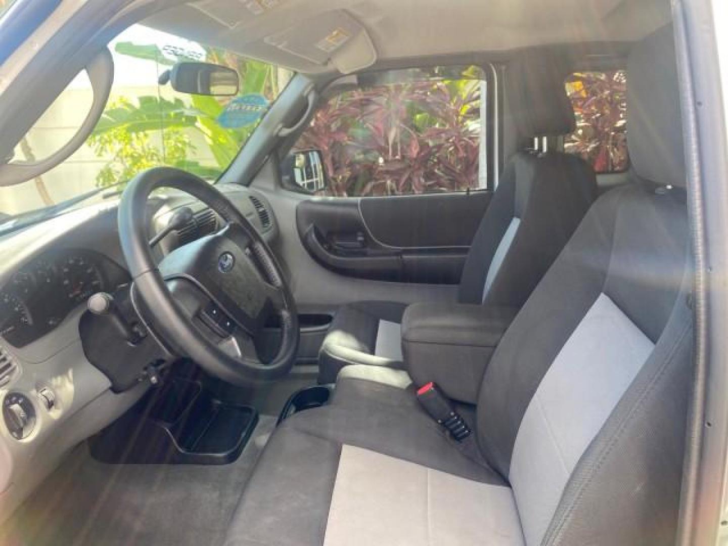 2011 Silver Metallic /Medium Dark Flint Ford Ranger XLT LOW MILES 69,782 4WD (1FTLR4FEXBP) with an 4.0L SOHC V6 Engine engine, Automatic transmission, located at 4701 North Dixie Hwy, Pompano Beach, FL, 33064, (954) 422-2889, 26.240938, -80.123474 - OUR WEBPAGE FLORIDACARS1.COM HAS OVER 100 PHOTOS AND FREE CARFAX LINK 2011 FORD RANGER XLT 4 DOOR 4 WHEEL DRIVE LEER CAMPER TOP FIBER GLASS ICE COLD A/C VIN: 1FTLR4FEXBPA23552 1 F T L R 4 F E X B P A 2 3 5 5 2 4 DOOR EXTENDED CAB PICKUP 4.0L V6 F SOHC 16V GASOLINE 19 MPG REAR WHEEL DRIVE W/ 4X4 Feat - Photo#47