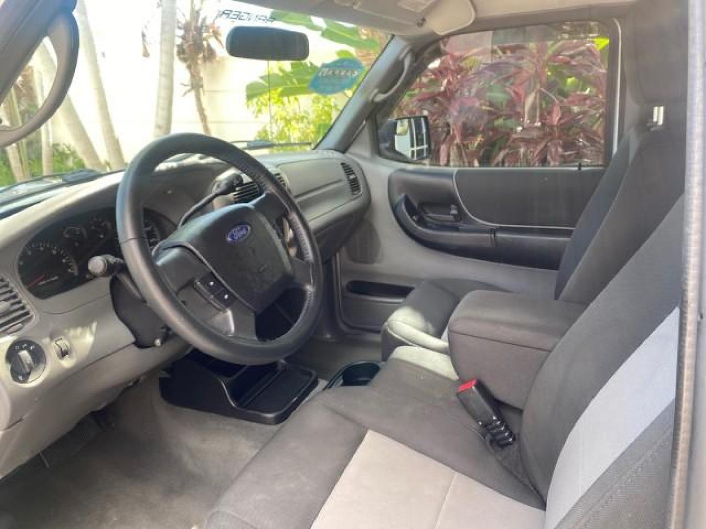 2011 Silver Metallic /Medium Dark Flint Ford Ranger XLT LOW MILES 69,782 4WD (1FTLR4FEXBP) with an 4.0L SOHC V6 Engine engine, Automatic transmission, located at 4701 North Dixie Hwy, Pompano Beach, FL, 33064, (954) 422-2889, 26.240938, -80.123474 - OUR WEBPAGE FLORIDACARS1.COM HAS OVER 100 PHOTOS AND FREE CARFAX LINK 2011 FORD RANGER XLT 4 DOOR 4 WHEEL DRIVE LEER CAMPER TOP FIBER GLASS ICE COLD A/C VIN: 1FTLR4FEXBPA23552 1 F T L R 4 F E X B P A 2 3 5 5 2 4 DOOR EXTENDED CAB PICKUP 4.0L V6 F SOHC 16V GASOLINE 19 MPG REAR WHEEL DRIVE W/ 4X4 Feat - Photo#48