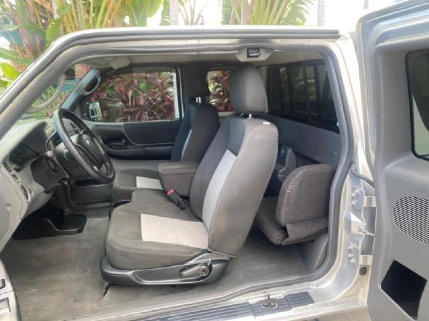 2011 Silver Metallic /Medium Dark Flint Ford Ranger XLT LOW MILES 69,782 4WD (1FTLR4FEXBP) with an 4.0L SOHC V6 Engine engine, Automatic transmission, located at 4701 North Dixie Hwy, Pompano Beach, FL, 33064, (954) 422-2889, 26.240938, -80.123474 - OUR WEBPAGE FLORIDACARS1.COM HAS OVER 100 PHOTOS AND FREE CARFAX LINK 2011 FORD RANGER XLT 4 DOOR 4 WHEEL DRIVE LEER CAMPER TOP FIBER GLASS ICE COLD A/C VIN: 1FTLR4FEXBPA23552 1 F T L R 4 F E X B P A 2 3 5 5 2 4 DOOR EXTENDED CAB PICKUP 4.0L V6 F SOHC 16V GASOLINE 19 MPG REAR WHEEL DRIVE W/ 4X4 Feat - Photo#78