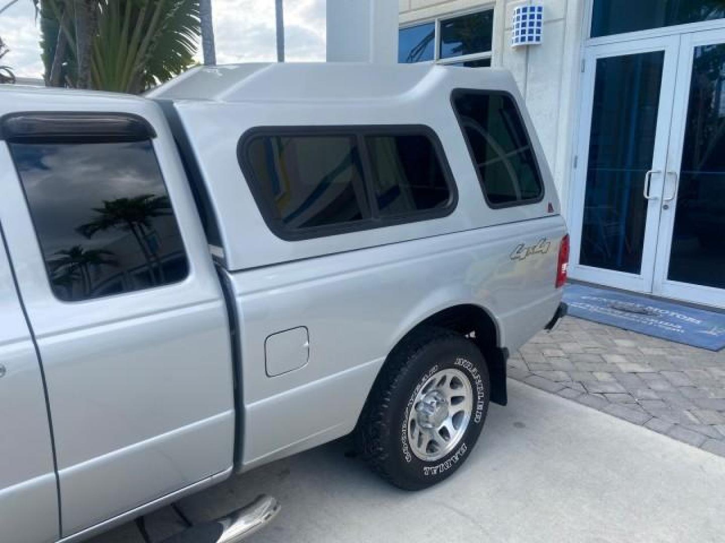 2011 Silver Metallic /Medium Dark Flint Ford Ranger XLT LOW MILES 69,782 4WD (1FTLR4FEXBP) with an 4.0L SOHC V6 Engine engine, Automatic transmission, located at 4701 North Dixie Hwy, Pompano Beach, FL, 33064, (954) 422-2889, 26.240938, -80.123474 - OUR WEBPAGE FLORIDACARS1.COM HAS OVER 100 PHOTOS AND FREE CARFAX LINK 2011 FORD RANGER XLT 4 DOOR 4 WHEEL DRIVE LEER CAMPER TOP FIBER GLASS ICE COLD A/C VIN: 1FTLR4FEXBPA23552 1 F T L R 4 F E X B P A 2 3 5 5 2 4 DOOR EXTENDED CAB PICKUP 4.0L V6 F SOHC 16V GASOLINE 19 MPG REAR WHEEL DRIVE W/ 4X4 Feat - Photo#82
