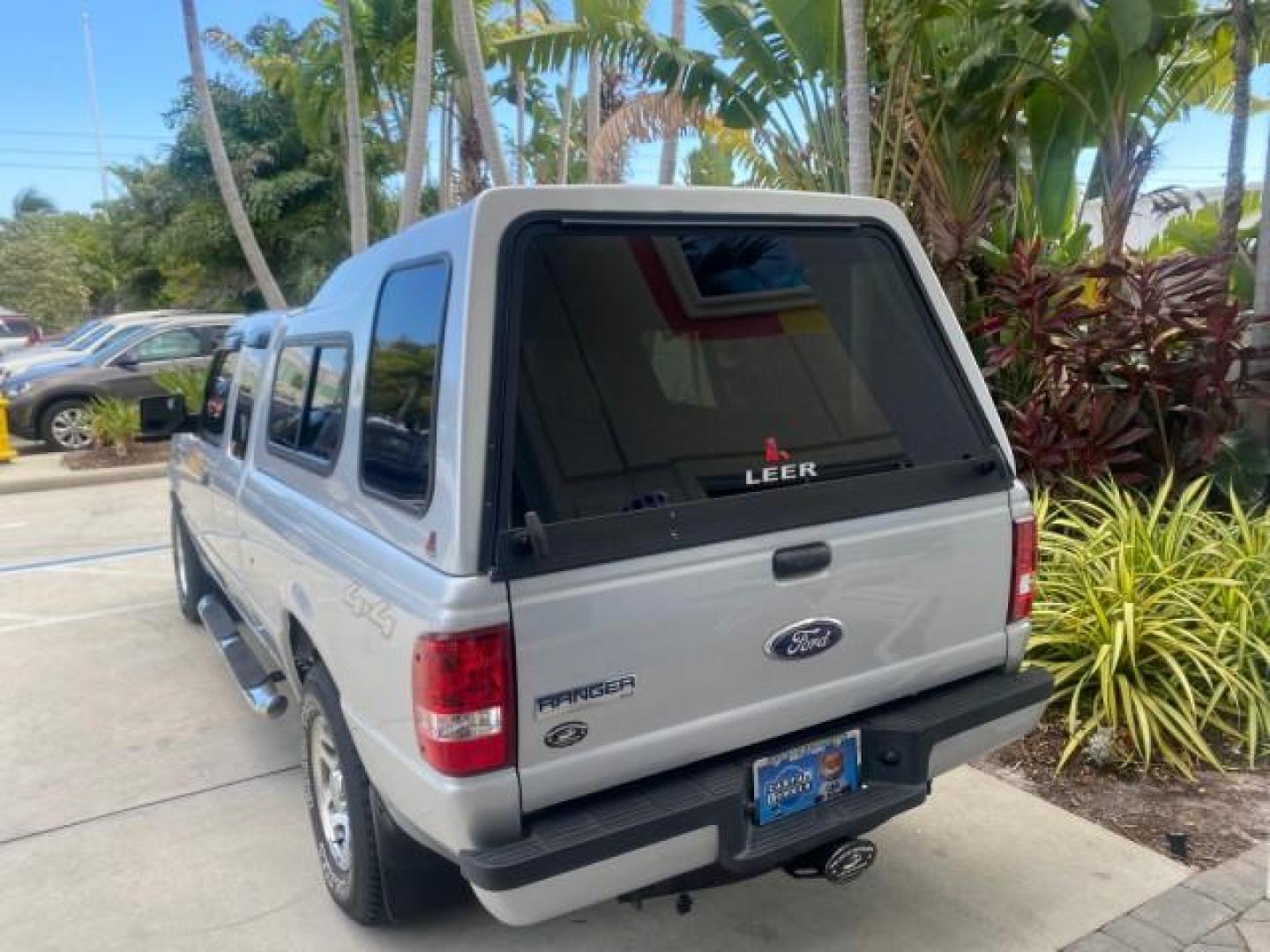 2011 Silver Metallic /Medium Dark Flint Ford Ranger XLT LOW MILES 69,782 4WD (1FTLR4FEXBP) with an 4.0L SOHC V6 Engine engine, Automatic transmission, located at 4701 North Dixie Hwy, Pompano Beach, FL, 33064, (954) 422-2889, 26.240938, -80.123474 - OUR WEBPAGE FLORIDACARS1.COM HAS OVER 100 PHOTOS AND FREE CARFAX LINK 2011 FORD RANGER XLT 4 DOOR 4 WHEEL DRIVE LEER CAMPER TOP FIBER GLASS ICE COLD A/C VIN: 1FTLR4FEXBPA23552 1 F T L R 4 F E X B P A 2 3 5 5 2 4 DOOR EXTENDED CAB PICKUP 4.0L V6 F SOHC 16V GASOLINE 19 MPG REAR WHEEL DRIVE W/ 4X4 Feat - Photo#91