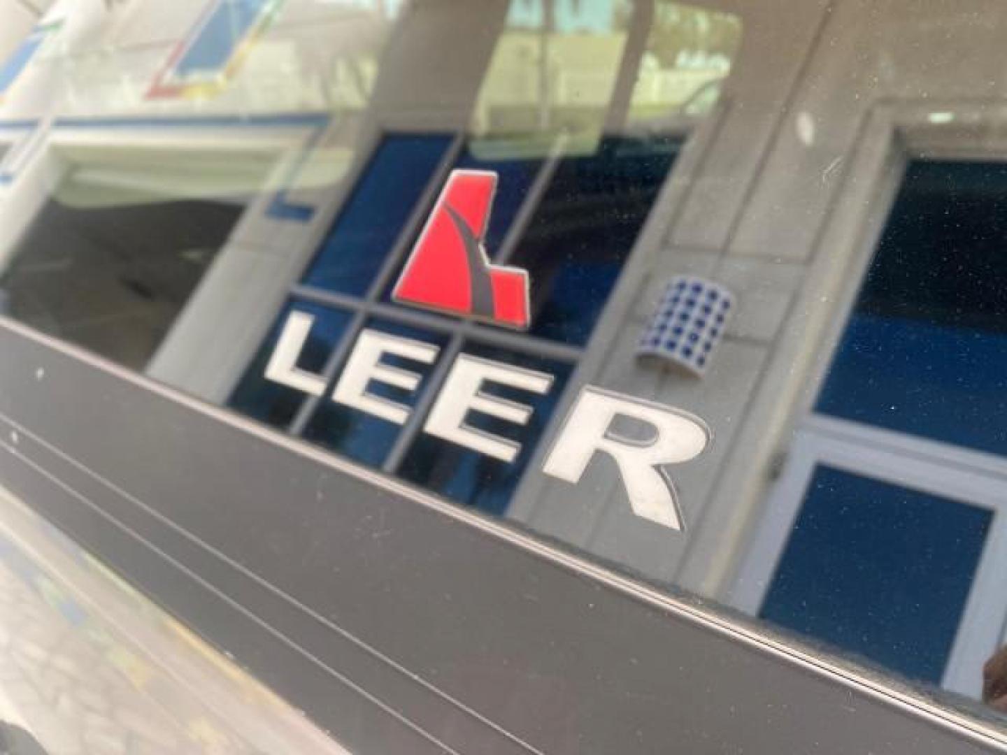 2011 Silver Metallic /Medium Dark Flint Ford Ranger XLT LOW MILES 69,782 4WD (1FTLR4FEXBP) with an 4.0L SOHC V6 Engine engine, Automatic transmission, located at 4701 North Dixie Hwy, Pompano Beach, FL, 33064, (954) 422-2889, 26.240938, -80.123474 - OUR WEBPAGE FLORIDACARS1.COM HAS OVER 100 PHOTOS AND FREE CARFAX LINK 2011 FORD RANGER XLT 4 DOOR 4 WHEEL DRIVE LEER CAMPER TOP FIBER GLASS ICE COLD A/C VIN: 1FTLR4FEXBPA23552 1 F T L R 4 F E X B P A 2 3 5 5 2 4 DOOR EXTENDED CAB PICKUP 4.0L V6 F SOHC 16V GASOLINE 19 MPG REAR WHEEL DRIVE W/ 4X4 Feat - Photo#95