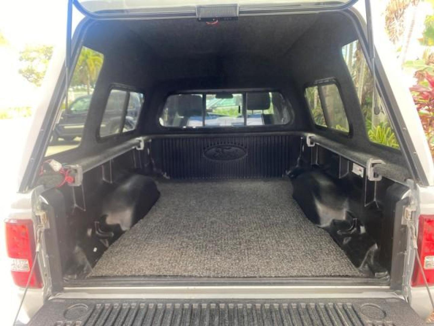 2011 Silver Metallic /Medium Dark Flint Ford Ranger XLT LOW MILES 69,782 4WD (1FTLR4FEXBP) with an 4.0L SOHC V6 Engine engine, Automatic transmission, located at 4701 North Dixie Hwy, Pompano Beach, FL, 33064, (954) 422-2889, 26.240938, -80.123474 - OUR WEBPAGE FLORIDACARS1.COM HAS OVER 100 PHOTOS AND FREE CARFAX LINK 2011 FORD RANGER XLT 4 DOOR 4 WHEEL DRIVE LEER CAMPER TOP FIBER GLASS ICE COLD A/C VIN: 1FTLR4FEXBPA23552 1 F T L R 4 F E X B P A 2 3 5 5 2 4 DOOR EXTENDED CAB PICKUP 4.0L V6 F SOHC 16V GASOLINE 19 MPG REAR WHEEL DRIVE W/ 4X4 Feat - Photo#98