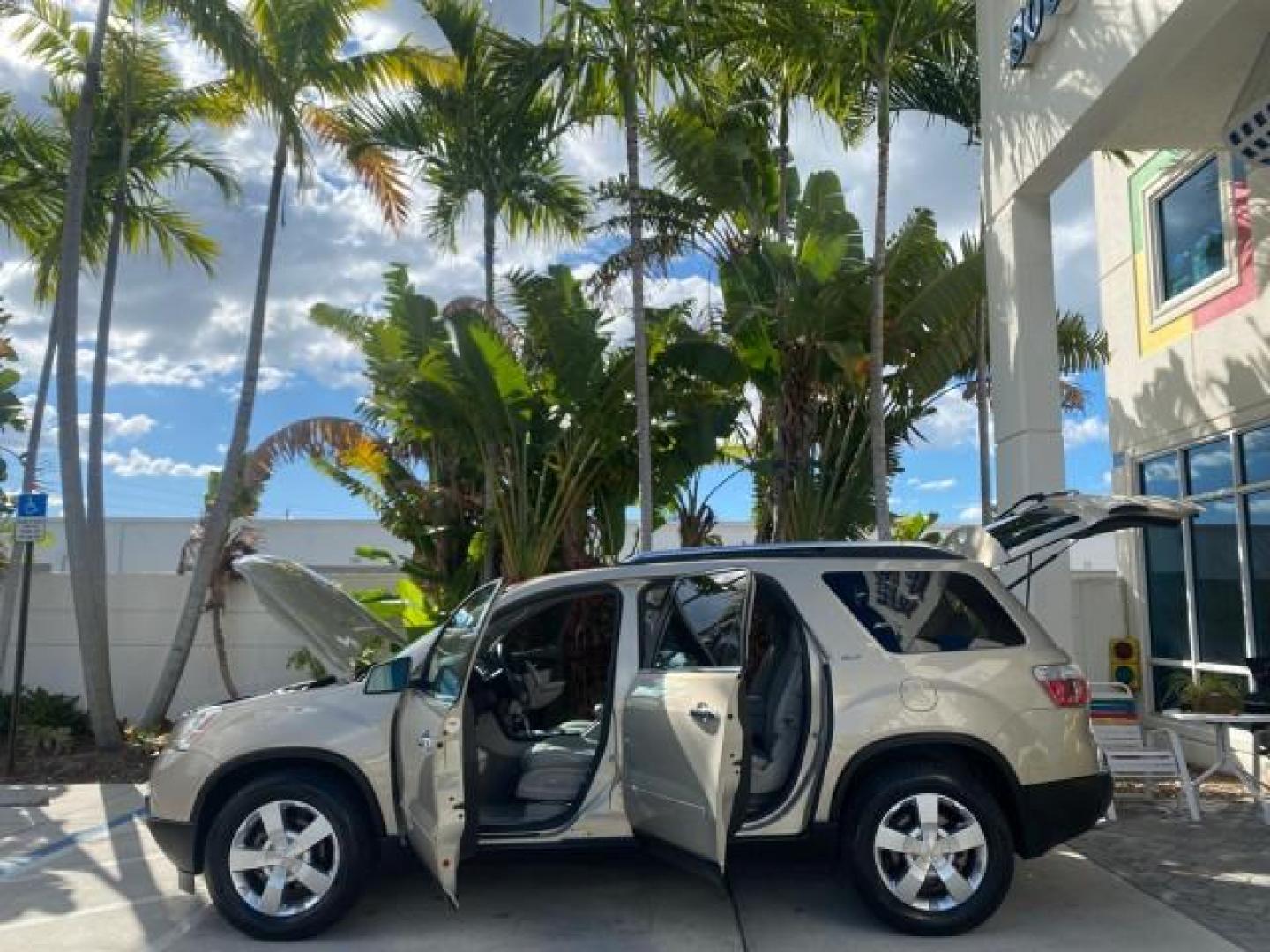 2009 Gold Mist Metallic /Light Titanium GMC Acadia SLT2 LOW MILES LEATHER SUV (1GKER33D89J) with an 3.6L SIDI V6 Engine engine, Automatic transmission, located at 4701 North Dixie Hwy, Pompano Beach, FL, 33064, (954) 422-2889, 26.240938, -80.123474 - OUR WEBPAGE FLORIDACARS1.COM HAS OVER 100 PHOTOS AND FREE CARFAX LINK 2009 GMC ACADIA SLT-2 LEATHER 3RD ROW SUNROOF LOW MILES VIN: 1GKER33D89J136397 1 G K E R 3 3 D 8 9 J 1 3 6 3 9 7 4 DOOR WAGON/SPORT UTILITY 3.6L V6 F DOHC 24V GASOLINE 24 MPG FRONT WHEEL DRIVE Features ABS Brakes Air Conditioning - Photo#8
