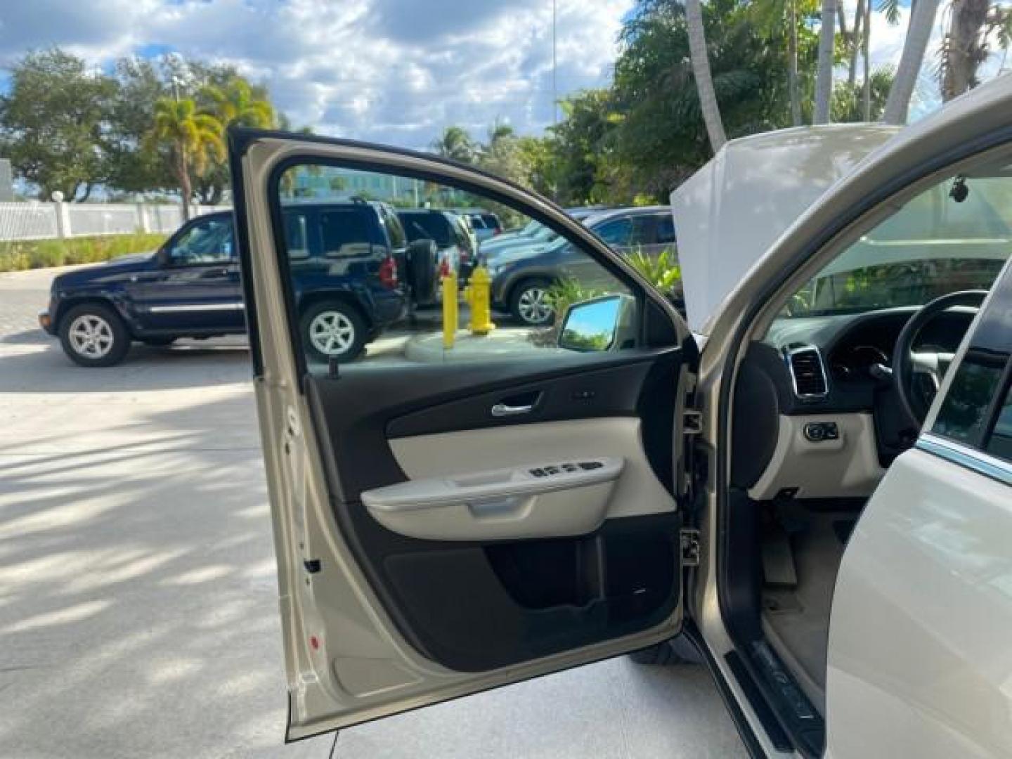 2009 Gold Mist Metallic /Light Titanium GMC Acadia SLT2 LOW MILES LEATHER SUV (1GKER33D89J) with an 3.6L SIDI V6 Engine engine, Automatic transmission, located at 4701 North Dixie Hwy, Pompano Beach, FL, 33064, (954) 422-2889, 26.240938, -80.123474 - OUR WEBPAGE FLORIDACARS1.COM HAS OVER 100 PHOTOS AND FREE CARFAX LINK 2009 GMC ACADIA SLT-2 LEATHER 3RD ROW SUNROOF LOW MILES VIN: 1GKER33D89J136397 1 G K E R 3 3 D 8 9 J 1 3 6 3 9 7 4 DOOR WAGON/SPORT UTILITY 3.6L V6 F DOHC 24V GASOLINE 24 MPG FRONT WHEEL DRIVE Features ABS Brakes Air Conditioning - Photo#9