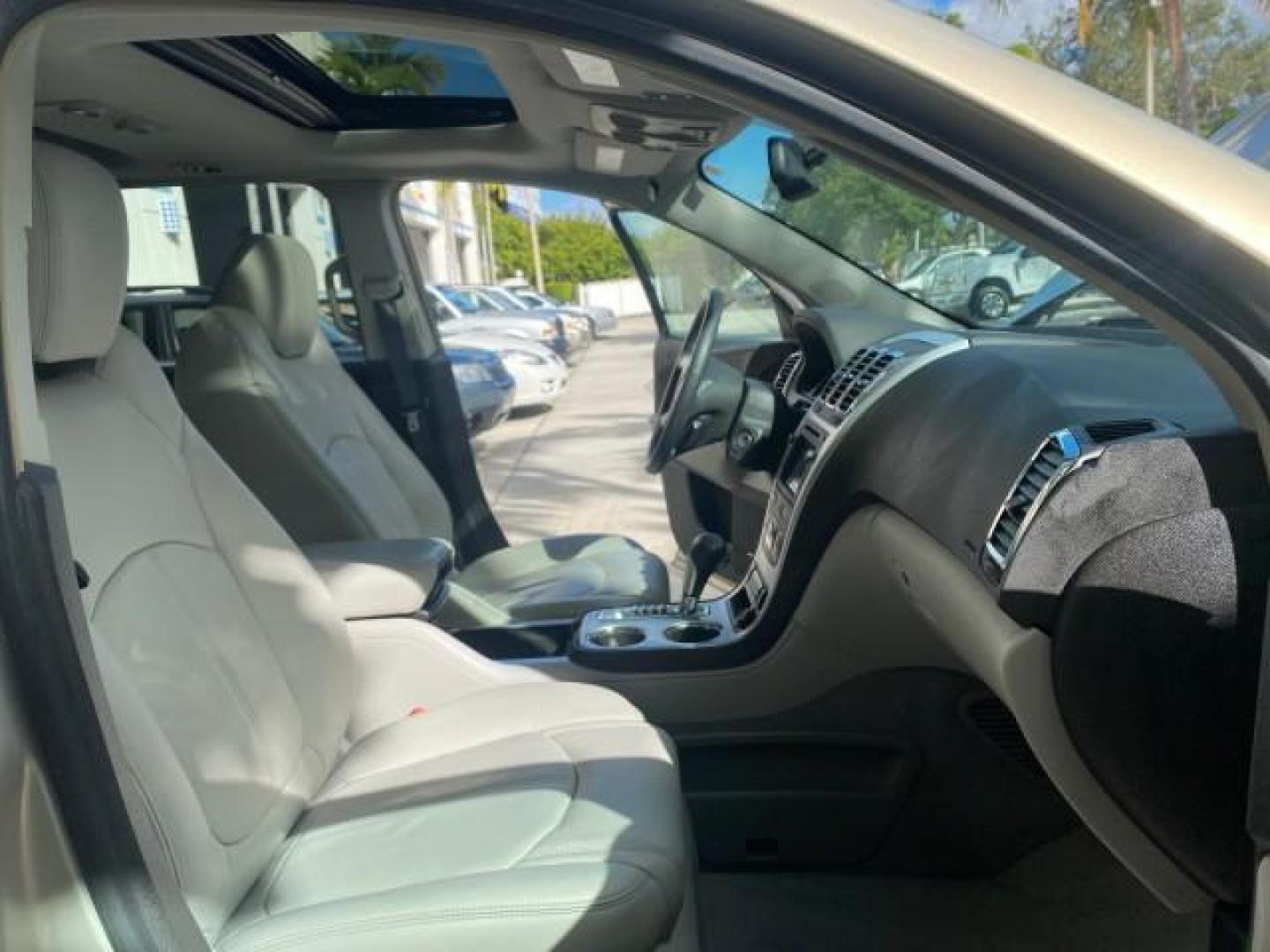 2009 Gold Mist Metallic /Light Titanium GMC Acadia SLT2 LOW MILES LEATHER SUV (1GKER33D89J) with an 3.6L SIDI V6 Engine engine, Automatic transmission, located at 4701 North Dixie Hwy, Pompano Beach, FL, 33064, (954) 422-2889, 26.240938, -80.123474 - OUR WEBPAGE FLORIDACARS1.COM HAS OVER 100 PHOTOS AND FREE CARFAX LINK 2009 GMC ACADIA SLT-2 LEATHER 3RD ROW SUNROOF LOW MILES VIN: 1GKER33D89J136397 1 G K E R 3 3 D 8 9 J 1 3 6 3 9 7 4 DOOR WAGON/SPORT UTILITY 3.6L V6 F DOHC 24V GASOLINE 24 MPG FRONT WHEEL DRIVE Features ABS Brakes Air Conditioning - Photo#12