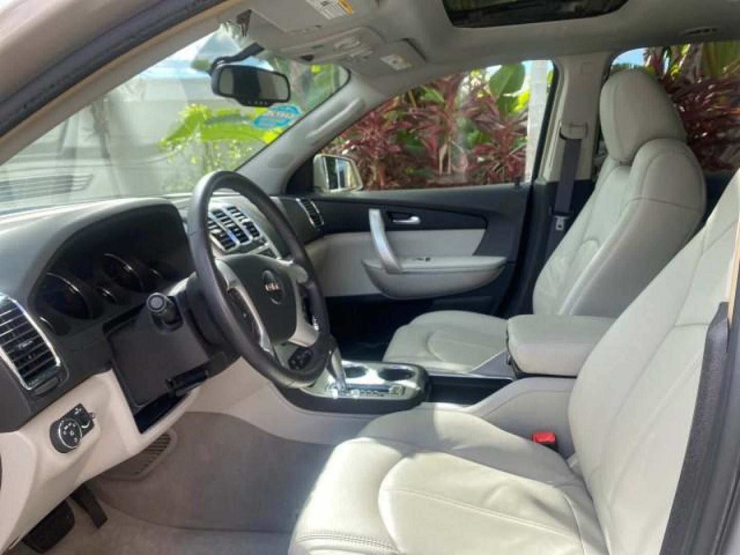 2009 Gold Mist Metallic /Light Titanium GMC Acadia SLT2 LOW MILES LEATHER SUV (1GKER33D89J) with an 3.6L SIDI V6 Engine engine, Automatic transmission, located at 4701 North Dixie Hwy, Pompano Beach, FL, 33064, (954) 422-2889, 26.240938, -80.123474 - OUR WEBPAGE FLORIDACARS1.COM HAS OVER 100 PHOTOS AND FREE CARFAX LINK 2009 GMC ACADIA SLT-2 LEATHER 3RD ROW SUNROOF LOW MILES VIN: 1GKER33D89J136397 1 G K E R 3 3 D 8 9 J 1 3 6 3 9 7 4 DOOR WAGON/SPORT UTILITY 3.6L V6 F DOHC 24V GASOLINE 24 MPG FRONT WHEEL DRIVE Features ABS Brakes Air Conditioning - Photo#46