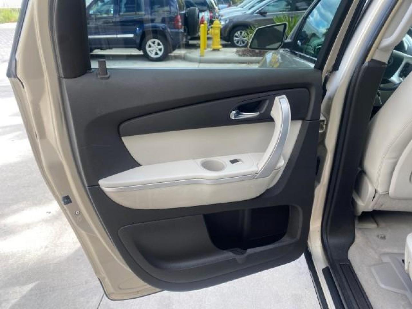 2009 Gold Mist Metallic /Light Titanium GMC Acadia SLT2 LOW MILES LEATHER SUV (1GKER33D89J) with an 3.6L SIDI V6 Engine engine, Automatic transmission, located at 4701 North Dixie Hwy, Pompano Beach, FL, 33064, (954) 422-2889, 26.240938, -80.123474 - OUR WEBPAGE FLORIDACARS1.COM HAS OVER 100 PHOTOS AND FREE CARFAX LINK 2009 GMC ACADIA SLT-2 LEATHER 3RD ROW SUNROOF LOW MILES VIN: 1GKER33D89J136397 1 G K E R 3 3 D 8 9 J 1 3 6 3 9 7 4 DOOR WAGON/SPORT UTILITY 3.6L V6 F DOHC 24V GASOLINE 24 MPG FRONT WHEEL DRIVE Features ABS Brakes Air Conditioning - Photo#76