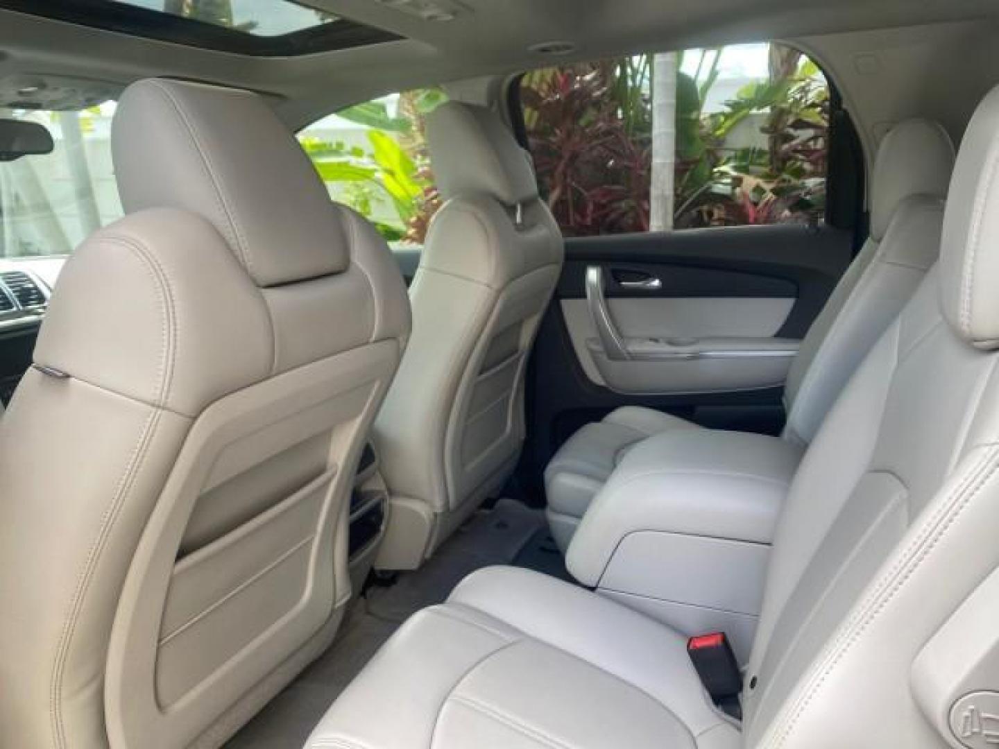 2009 Gold Mist Metallic /Light Titanium GMC Acadia SLT2 LOW MILES LEATHER SUV (1GKER33D89J) with an 3.6L SIDI V6 Engine engine, Automatic transmission, located at 4701 North Dixie Hwy, Pompano Beach, FL, 33064, (954) 422-2889, 26.240938, -80.123474 - OUR WEBPAGE FLORIDACARS1.COM HAS OVER 100 PHOTOS AND FREE CARFAX LINK 2009 GMC ACADIA SLT-2 LEATHER 3RD ROW SUNROOF LOW MILES VIN: 1GKER33D89J136397 1 G K E R 3 3 D 8 9 J 1 3 6 3 9 7 4 DOOR WAGON/SPORT UTILITY 3.6L V6 F DOHC 24V GASOLINE 24 MPG FRONT WHEEL DRIVE Features ABS Brakes Air Conditioning - Photo#79