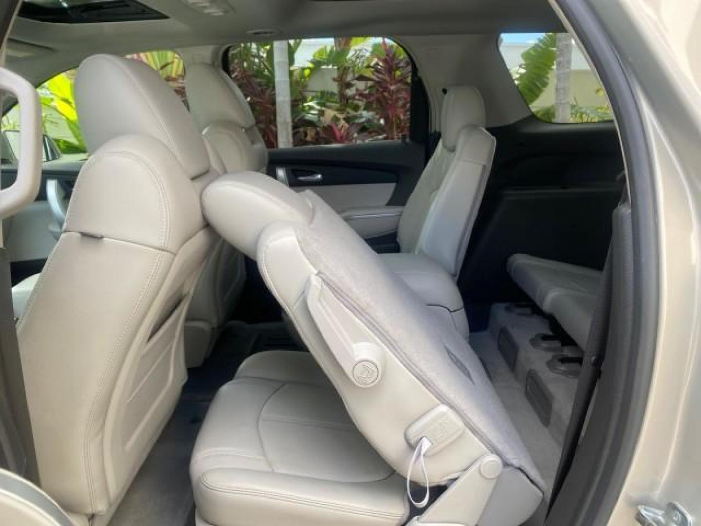 2009 Gold Mist Metallic /Light Titanium GMC Acadia SLT2 LOW MILES LEATHER SUV (1GKER33D89J) with an 3.6L SIDI V6 Engine engine, Automatic transmission, located at 4701 North Dixie Hwy, Pompano Beach, FL, 33064, (954) 422-2889, 26.240938, -80.123474 - OUR WEBPAGE FLORIDACARS1.COM HAS OVER 100 PHOTOS AND FREE CARFAX LINK 2009 GMC ACADIA SLT-2 LEATHER 3RD ROW SUNROOF LOW MILES VIN: 1GKER33D89J136397 1 G K E R 3 3 D 8 9 J 1 3 6 3 9 7 4 DOOR WAGON/SPORT UTILITY 3.6L V6 F DOHC 24V GASOLINE 24 MPG FRONT WHEEL DRIVE Features ABS Brakes Air Conditioning - Photo#82