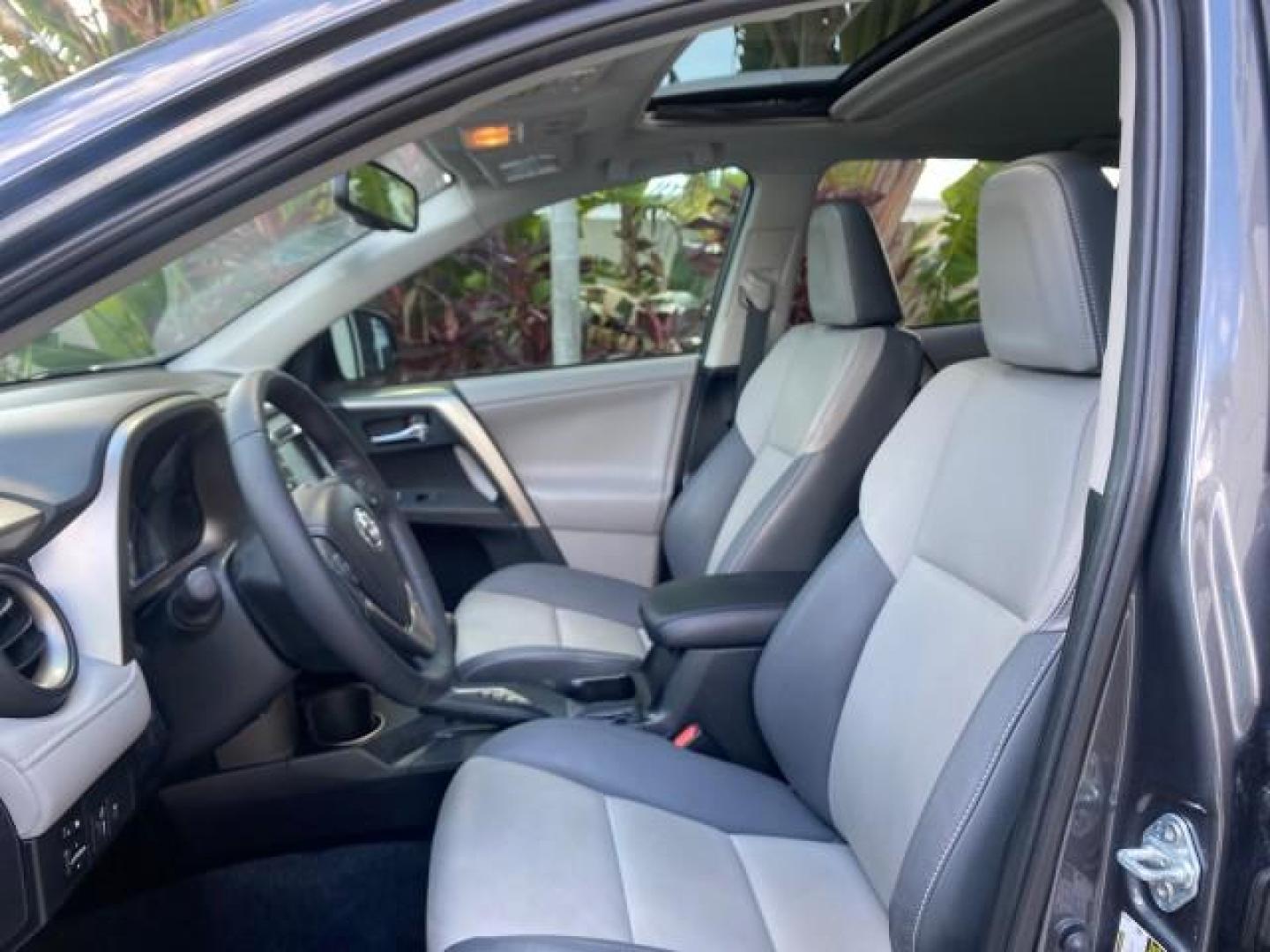 2013 Magnetic Gray Metallic /Ash Toyota RAV4 Limited LOW MILES 41,052 1 OWNER (2T3YFREVXDW) with an 2.5L DOHC SFI 16-Valve I4 Engine engine, Automatic transmission, located at 4701 North Dixie Hwy, Pompano Beach, FL, 33064, (954) 422-2889, 26.240938, -80.123474 - OUR WEBPAGE FLORIDACARS1.COM HAS OVER 100 PHOTOS AND FREE CARFAX LINK 2013 TOYOTA RAV4 LIMITED LEATHER SUNROOF THIS IS THE MOST LOADED RAV4 WE'VE EVER LISTED VIN: 2T3YFREVXDW067801 2 T 3 Y F R E V X D W 0 6 7 8 0 1 4 DOOR WAGON/SPORT UTILITY 2.5L I4 F DOHC 16V GASOLINE 31 MPG FRONT WHEEL DRIVE Featu - Photo#44