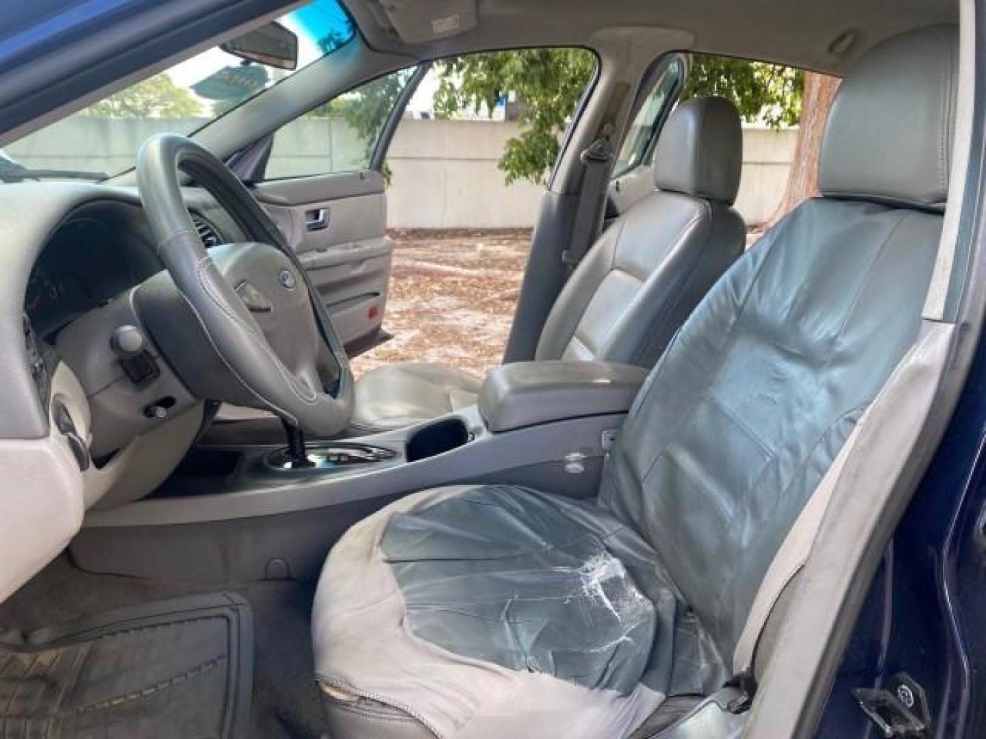 2000 Medium Royal Blue Metallic /Medium Graphite Ford Taurus SEL (1FAFP56S0YA) with an 3.0L DOHC SMPI 24-Valve V6 Duratec Engine engine, Automatic transmission, located at 4701 North Dixie Hwy, Pompano Beach, FL, 33064, (954) 422-2889, 26.240938, -80.123474 - OUR WEBPAGE FLORIDACARS1.COM HAS OVER 100 PHOTOS AND FREE CARFAX LINK 2000 FORD TAURUS SEL VIN: 1FAFP56S0YA125006 1 F A F P 5 6 S 0 Y A 1 2 5 0 0 6 SEDAN 4 DR 3.0L V6 F DOHC 24V GASOLINE 28 MPG FRONT WHEEL DRIVE Features ABS Brakes Air Conditioning Alloy Wheels AM/FM Stereo Automatic Transmission Au - Photo#10