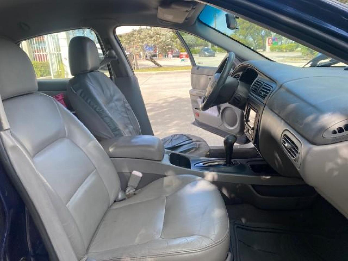 2000 Medium Royal Blue Metallic /Medium Graphite Ford Taurus SEL (1FAFP56S0YA) with an 3.0L DOHC SMPI 24-Valve V6 Duratec Engine engine, Automatic transmission, located at 4701 North Dixie Hwy, Pompano Beach, FL, 33064, (954) 422-2889, 26.240938, -80.123474 - OUR WEBPAGE FLORIDACARS1.COM HAS OVER 100 PHOTOS AND FREE CARFAX LINK 2000 FORD TAURUS SEL VIN: 1FAFP56S0YA125006 1 F A F P 5 6 S 0 Y A 1 2 5 0 0 6 SEDAN 4 DR 3.0L V6 F DOHC 24V GASOLINE 28 MPG FRONT WHEEL DRIVE Features ABS Brakes Air Conditioning Alloy Wheels AM/FM Stereo Automatic Transmission Au - Photo#12