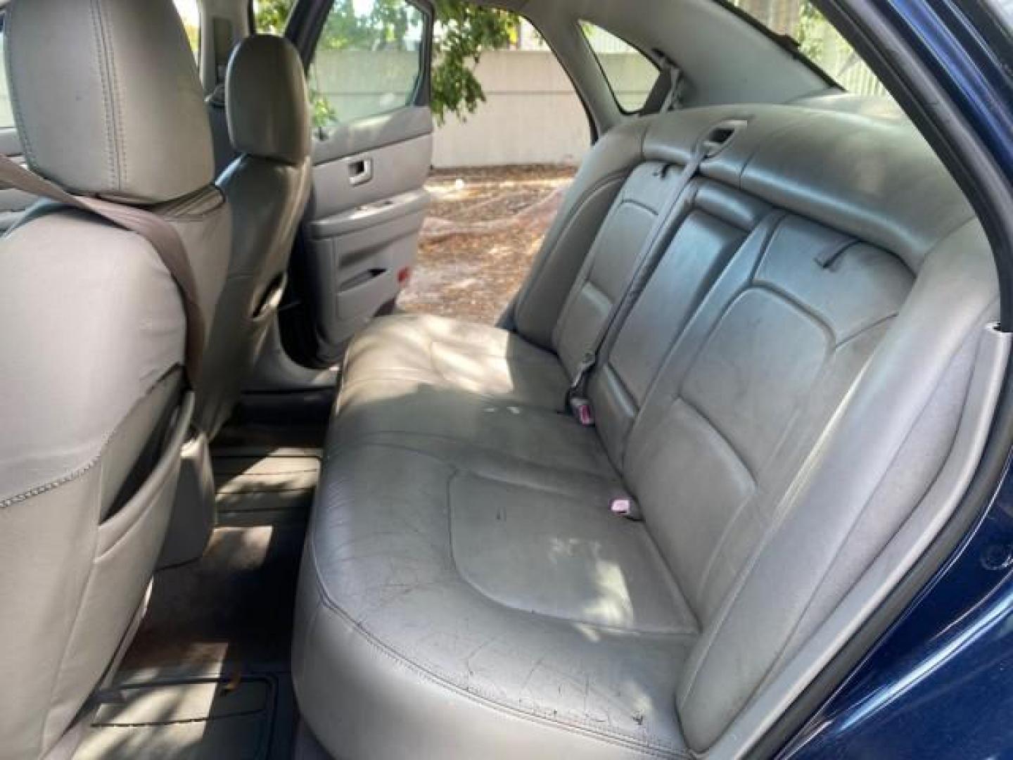 2000 Medium Royal Blue Metallic /Medium Graphite Ford Taurus SEL (1FAFP56S0YA) with an 3.0L DOHC SMPI 24-Valve V6 Duratec Engine engine, Automatic transmission, located at 4701 North Dixie Hwy, Pompano Beach, FL, 33064, (954) 422-2889, 26.240938, -80.123474 - OUR WEBPAGE FLORIDACARS1.COM HAS OVER 100 PHOTOS AND FREE CARFAX LINK 2000 FORD TAURUS SEL VIN: 1FAFP56S0YA125006 1 F A F P 5 6 S 0 Y A 1 2 5 0 0 6 SEDAN 4 DR 3.0L V6 F DOHC 24V GASOLINE 28 MPG FRONT WHEEL DRIVE Features ABS Brakes Air Conditioning Alloy Wheels AM/FM Stereo Automatic Transmission Au - Photo#14