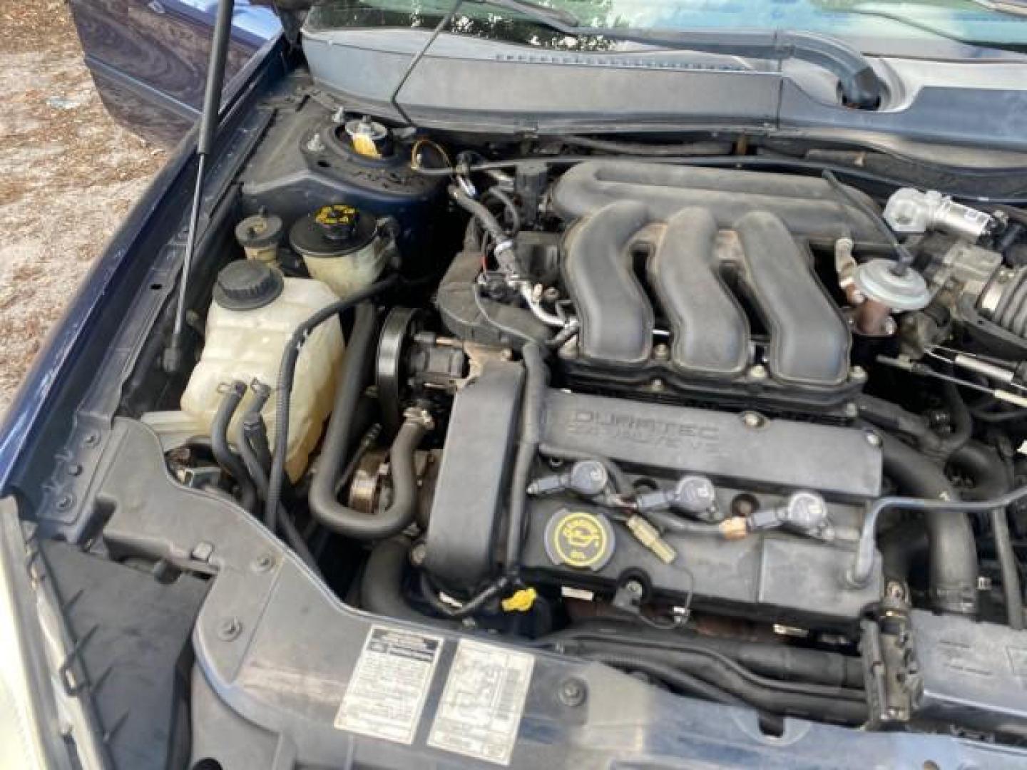 2000 Medium Royal Blue Metallic /Medium Graphite Ford Taurus SEL (1FAFP56S0YA) with an 3.0L DOHC SMPI 24-Valve V6 Duratec Engine engine, Automatic transmission, located at 4701 North Dixie Hwy, Pompano Beach, FL, 33064, (954) 422-2889, 26.240938, -80.123474 - OUR WEBPAGE FLORIDACARS1.COM HAS OVER 100 PHOTOS AND FREE CARFAX LINK 2000 FORD TAURUS SEL VIN: 1FAFP56S0YA125006 1 F A F P 5 6 S 0 Y A 1 2 5 0 0 6 SEDAN 4 DR 3.0L V6 F DOHC 24V GASOLINE 28 MPG FRONT WHEEL DRIVE Features ABS Brakes Air Conditioning Alloy Wheels AM/FM Stereo Automatic Transmission Au - Photo#25