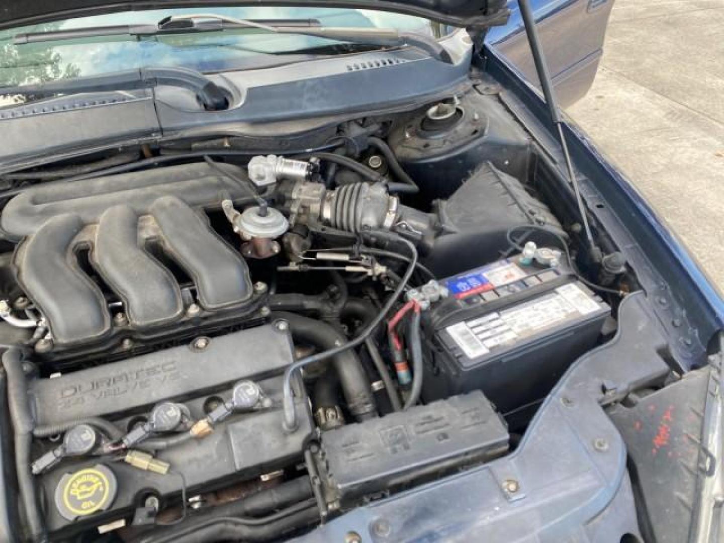 2000 Medium Royal Blue Metallic /Medium Graphite Ford Taurus SEL (1FAFP56S0YA) with an 3.0L DOHC SMPI 24-Valve V6 Duratec Engine engine, Automatic transmission, located at 4701 North Dixie Hwy, Pompano Beach, FL, 33064, (954) 422-2889, 26.240938, -80.123474 - OUR WEBPAGE FLORIDACARS1.COM HAS OVER 100 PHOTOS AND FREE CARFAX LINK 2000 FORD TAURUS SEL VIN: 1FAFP56S0YA125006 1 F A F P 5 6 S 0 Y A 1 2 5 0 0 6 SEDAN 4 DR 3.0L V6 F DOHC 24V GASOLINE 28 MPG FRONT WHEEL DRIVE Features ABS Brakes Air Conditioning Alloy Wheels AM/FM Stereo Automatic Transmission Au - Photo#26