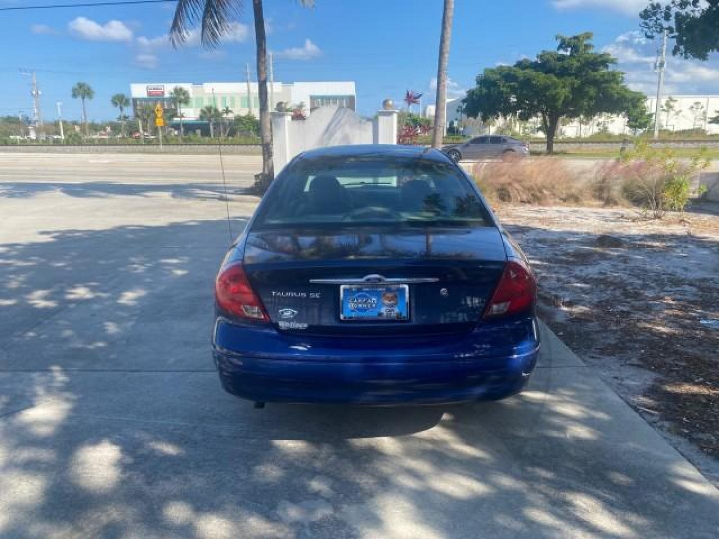 2000 Medium Royal Blue Metallic /Medium Graphite Ford Taurus SEL (1FAFP56S0YA) with an 3.0L DOHC SMPI 24-Valve V6 Duratec Engine engine, Automatic transmission, located at 4701 North Dixie Hwy, Pompano Beach, FL, 33064, (954) 422-2889, 26.240938, -80.123474 - OUR WEBPAGE FLORIDACARS1.COM HAS OVER 100 PHOTOS AND FREE CARFAX LINK 2000 FORD TAURUS SEL VIN: 1FAFP56S0YA125006 1 F A F P 5 6 S 0 Y A 1 2 5 0 0 6 SEDAN 4 DR 3.0L V6 F DOHC 24V GASOLINE 28 MPG FRONT WHEEL DRIVE Features ABS Brakes Air Conditioning Alloy Wheels AM/FM Stereo Automatic Transmission Au - Photo#35