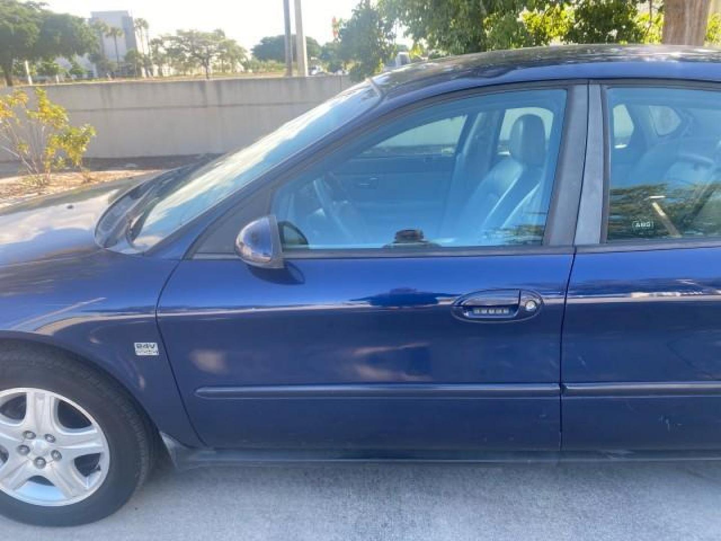 2000 Medium Royal Blue Metallic /Medium Graphite Ford Taurus SEL (1FAFP56S0YA) with an 3.0L DOHC SMPI 24-Valve V6 Duratec Engine engine, Automatic transmission, located at 4701 North Dixie Hwy, Pompano Beach, FL, 33064, (954) 422-2889, 26.240938, -80.123474 - OUR WEBPAGE FLORIDACARS1.COM HAS OVER 100 PHOTOS AND FREE CARFAX LINK 2000 FORD TAURUS SEL VIN: 1FAFP56S0YA125006 1 F A F P 5 6 S 0 Y A 1 2 5 0 0 6 SEDAN 4 DR 3.0L V6 F DOHC 24V GASOLINE 28 MPG FRONT WHEEL DRIVE Features ABS Brakes Air Conditioning Alloy Wheels AM/FM Stereo Automatic Transmission Au - Photo#37