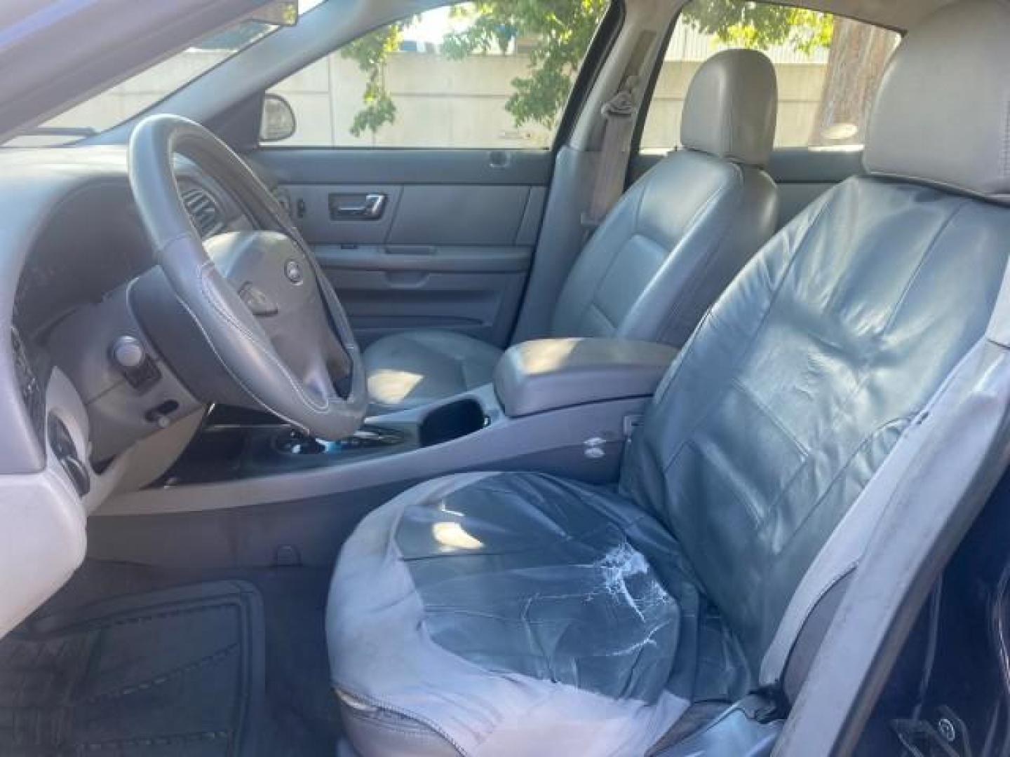 2000 Medium Royal Blue Metallic /Medium Graphite Ford Taurus SEL (1FAFP56S0YA) with an 3.0L DOHC SMPI 24-Valve V6 Duratec Engine engine, Automatic transmission, located at 4701 North Dixie Hwy, Pompano Beach, FL, 33064, (954) 422-2889, 26.240938, -80.123474 - OUR WEBPAGE FLORIDACARS1.COM HAS OVER 100 PHOTOS AND FREE CARFAX LINK 2000 FORD TAURUS SEL VIN: 1FAFP56S0YA125006 1 F A F P 5 6 S 0 Y A 1 2 5 0 0 6 SEDAN 4 DR 3.0L V6 F DOHC 24V GASOLINE 28 MPG FRONT WHEEL DRIVE Features ABS Brakes Air Conditioning Alloy Wheels AM/FM Stereo Automatic Transmission Au - Photo#43