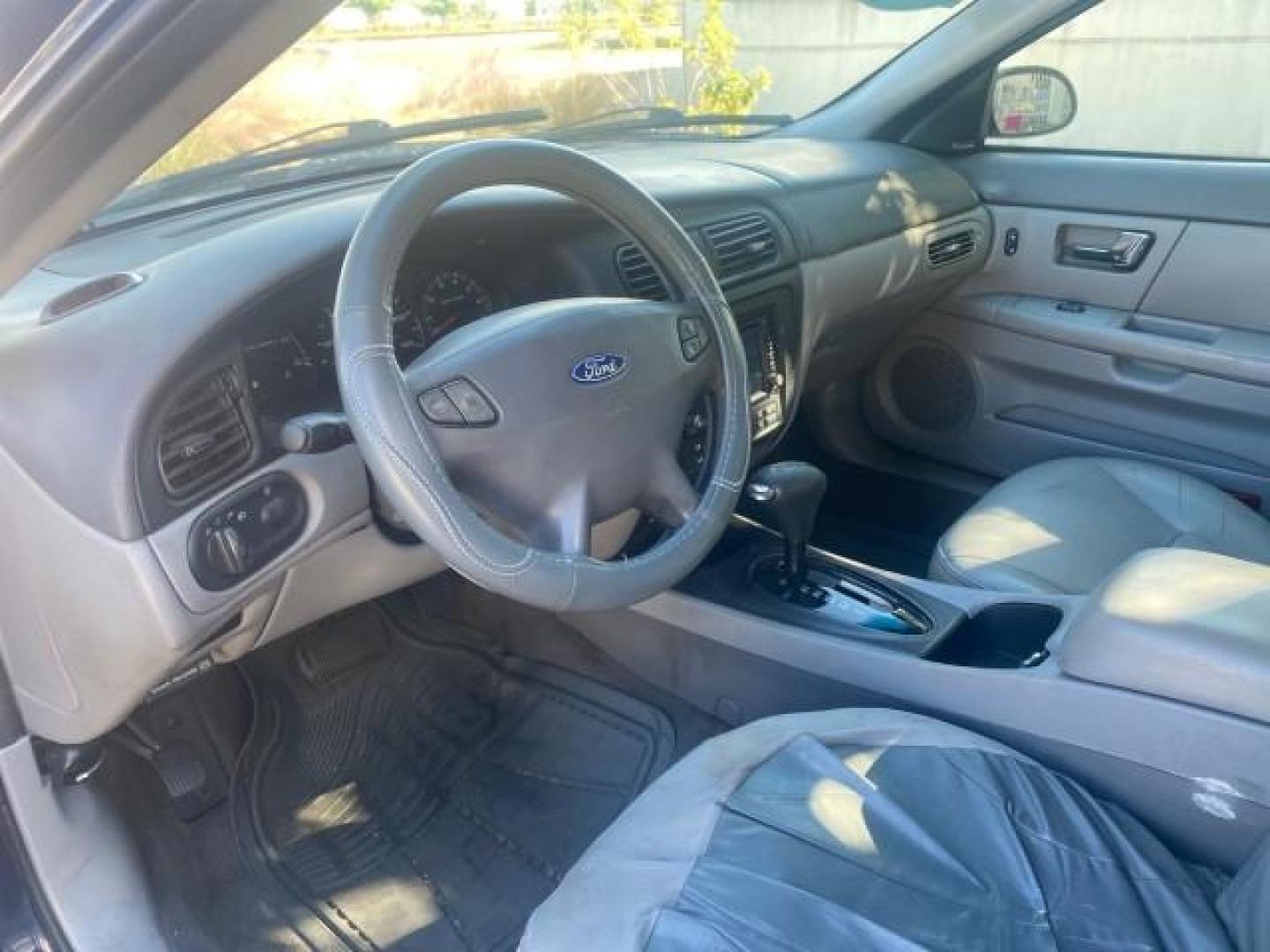 2000 Medium Royal Blue Metallic /Medium Graphite Ford Taurus SEL (1FAFP56S0YA) with an 3.0L DOHC SMPI 24-Valve V6 Duratec Engine engine, Automatic transmission, located at 4701 North Dixie Hwy, Pompano Beach, FL, 33064, (954) 422-2889, 26.240938, -80.123474 - OUR WEBPAGE FLORIDACARS1.COM HAS OVER 100 PHOTOS AND FREE CARFAX LINK 2000 FORD TAURUS SEL VIN: 1FAFP56S0YA125006 1 F A F P 5 6 S 0 Y A 1 2 5 0 0 6 SEDAN 4 DR 3.0L V6 F DOHC 24V GASOLINE 28 MPG FRONT WHEEL DRIVE Features ABS Brakes Air Conditioning Alloy Wheels AM/FM Stereo Automatic Transmission Au - Photo#48