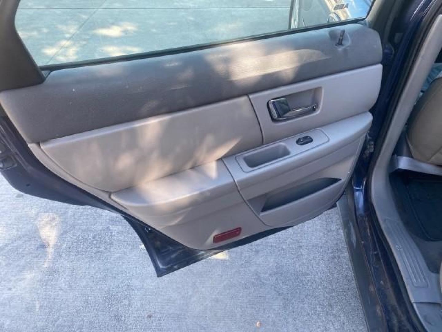 2000 Medium Royal Blue Metallic /Medium Graphite Ford Taurus SEL (1FAFP56S0YA) with an 3.0L DOHC SMPI 24-Valve V6 Duratec Engine engine, Automatic transmission, located at 4701 North Dixie Hwy, Pompano Beach, FL, 33064, (954) 422-2889, 26.240938, -80.123474 - OUR WEBPAGE FLORIDACARS1.COM HAS OVER 100 PHOTOS AND FREE CARFAX LINK 2000 FORD TAURUS SEL VIN: 1FAFP56S0YA125006 1 F A F P 5 6 S 0 Y A 1 2 5 0 0 6 SEDAN 4 DR 3.0L V6 F DOHC 24V GASOLINE 28 MPG FRONT WHEEL DRIVE Features ABS Brakes Air Conditioning Alloy Wheels AM/FM Stereo Automatic Transmission Au - Photo#73