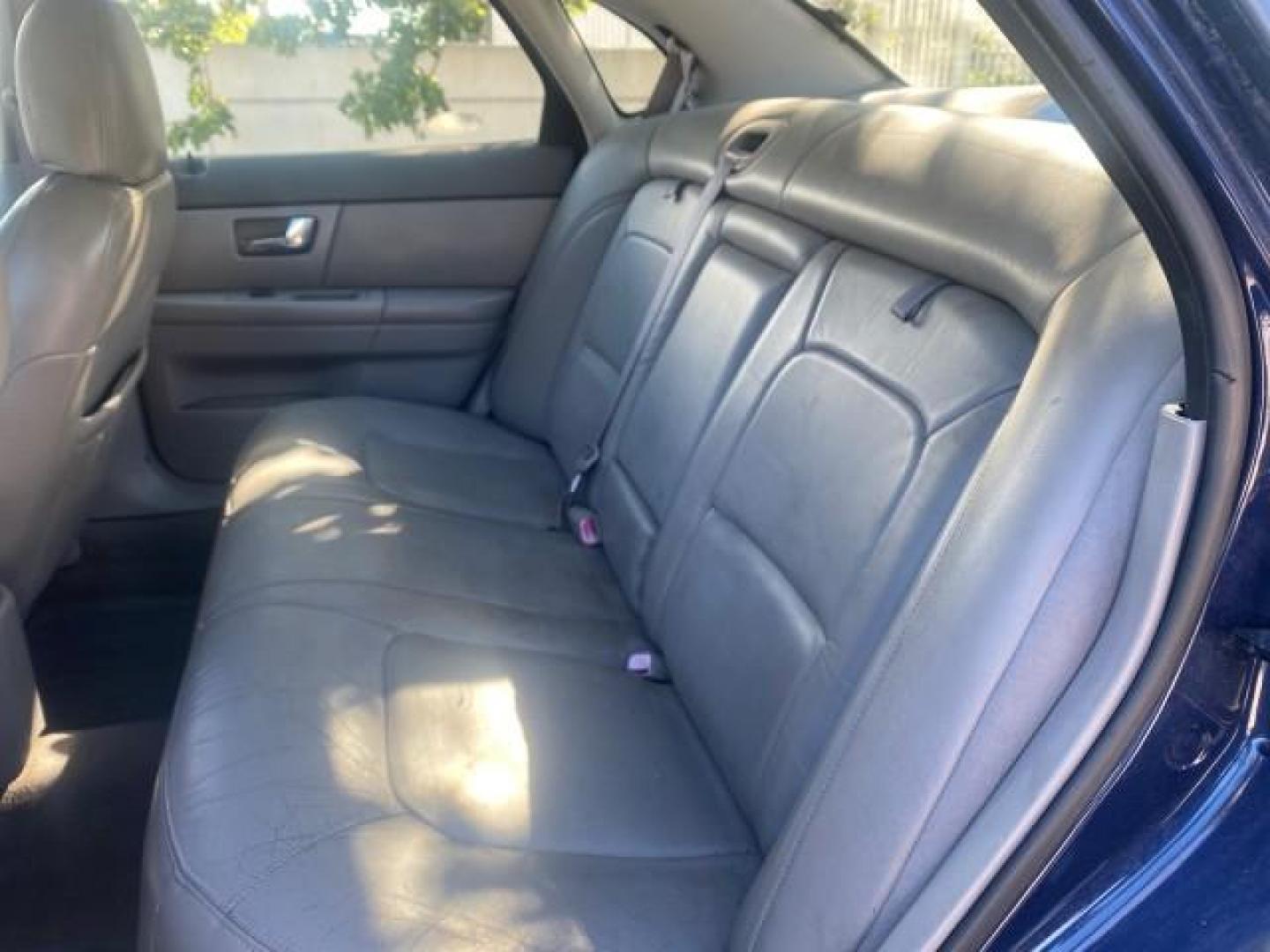2000 Medium Royal Blue Metallic /Medium Graphite Ford Taurus SEL (1FAFP56S0YA) with an 3.0L DOHC SMPI 24-Valve V6 Duratec Engine engine, Automatic transmission, located at 4701 North Dixie Hwy, Pompano Beach, FL, 33064, (954) 422-2889, 26.240938, -80.123474 - OUR WEBPAGE FLORIDACARS1.COM HAS OVER 100 PHOTOS AND FREE CARFAX LINK 2000 FORD TAURUS SEL VIN: 1FAFP56S0YA125006 1 F A F P 5 6 S 0 Y A 1 2 5 0 0 6 SEDAN 4 DR 3.0L V6 F DOHC 24V GASOLINE 28 MPG FRONT WHEEL DRIVE Features ABS Brakes Air Conditioning Alloy Wheels AM/FM Stereo Automatic Transmission Au - Photo#74