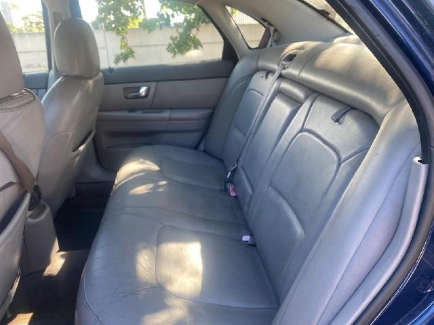 2000 Medium Royal Blue Metallic /Medium Graphite Ford Taurus SEL (1FAFP56S0YA) with an 3.0L DOHC SMPI 24-Valve V6 Duratec Engine engine, Automatic transmission, located at 4701 North Dixie Hwy, Pompano Beach, FL, 33064, (954) 422-2889, 26.240938, -80.123474 - OUR WEBPAGE FLORIDACARS1.COM HAS OVER 100 PHOTOS AND FREE CARFAX LINK 2000 FORD TAURUS SEL VIN: 1FAFP56S0YA125006 1 F A F P 5 6 S 0 Y A 1 2 5 0 0 6 SEDAN 4 DR 3.0L V6 F DOHC 24V GASOLINE 28 MPG FRONT WHEEL DRIVE Features ABS Brakes Air Conditioning Alloy Wheels AM/FM Stereo Automatic Transmission Au - Photo#75