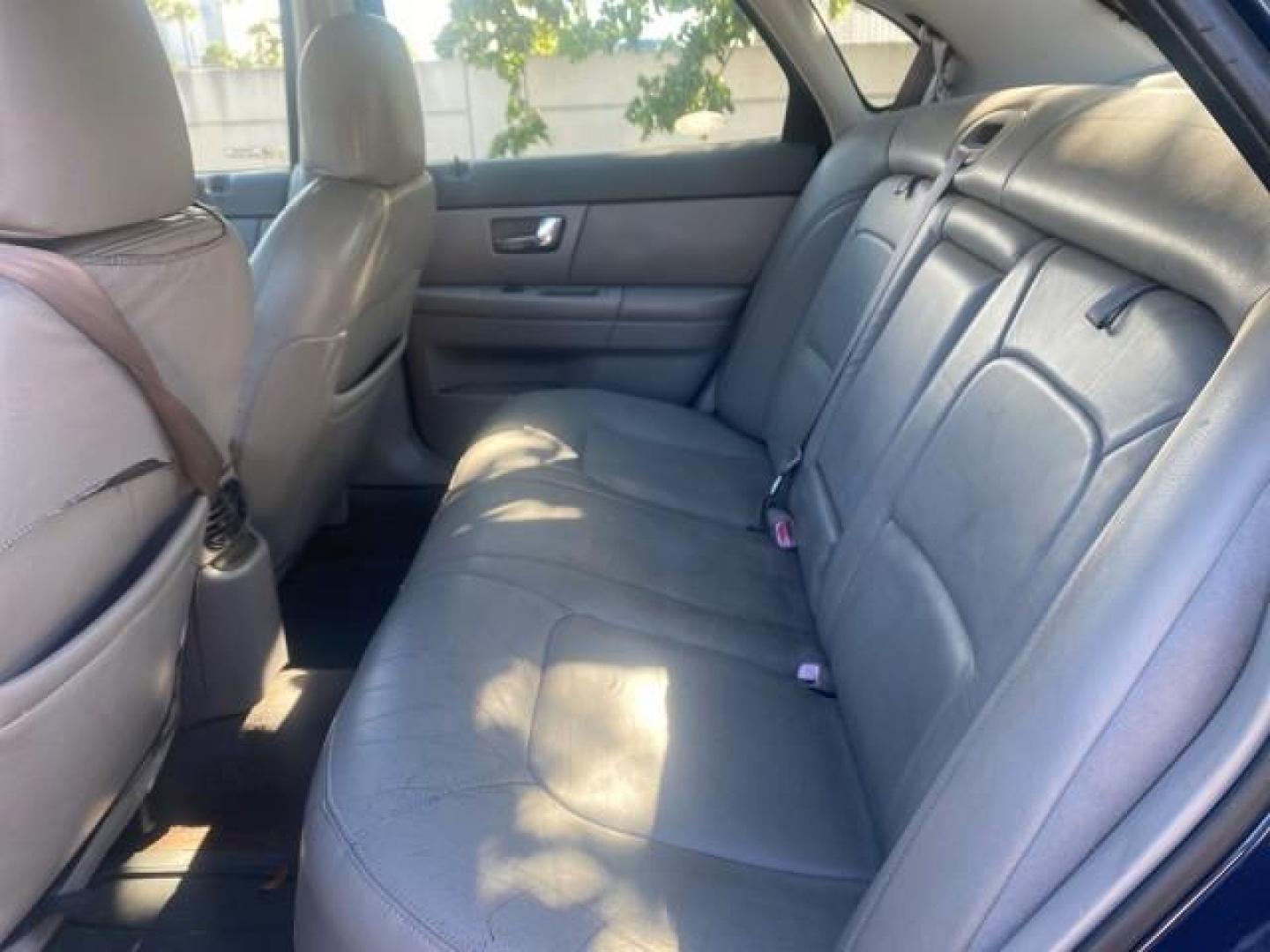 2000 Medium Royal Blue Metallic /Medium Graphite Ford Taurus SEL (1FAFP56S0YA) with an 3.0L DOHC SMPI 24-Valve V6 Duratec Engine engine, Automatic transmission, located at 4701 North Dixie Hwy, Pompano Beach, FL, 33064, (954) 422-2889, 26.240938, -80.123474 - OUR WEBPAGE FLORIDACARS1.COM HAS OVER 100 PHOTOS AND FREE CARFAX LINK 2000 FORD TAURUS SEL VIN: 1FAFP56S0YA125006 1 F A F P 5 6 S 0 Y A 1 2 5 0 0 6 SEDAN 4 DR 3.0L V6 F DOHC 24V GASOLINE 28 MPG FRONT WHEEL DRIVE Features ABS Brakes Air Conditioning Alloy Wheels AM/FM Stereo Automatic Transmission Au - Photo#76