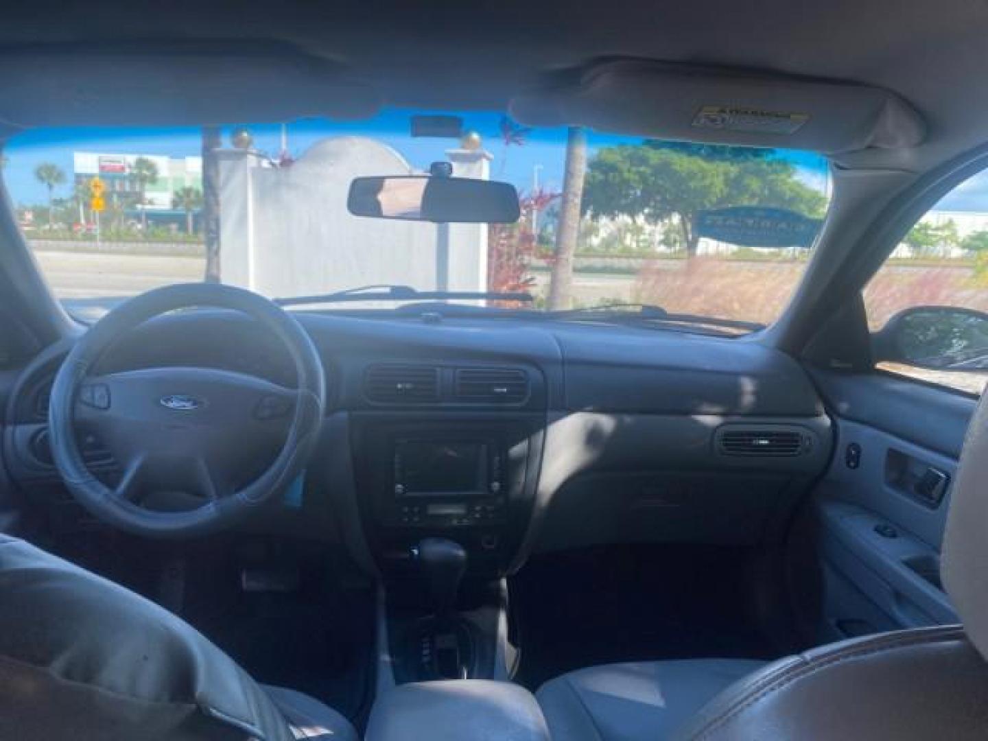 2000 Medium Royal Blue Metallic /Medium Graphite Ford Taurus SEL (1FAFP56S0YA) with an 3.0L DOHC SMPI 24-Valve V6 Duratec Engine engine, Automatic transmission, located at 4701 North Dixie Hwy, Pompano Beach, FL, 33064, (954) 422-2889, 26.240938, -80.123474 - OUR WEBPAGE FLORIDACARS1.COM HAS OVER 100 PHOTOS AND FREE CARFAX LINK 2000 FORD TAURUS SEL VIN: 1FAFP56S0YA125006 1 F A F P 5 6 S 0 Y A 1 2 5 0 0 6 SEDAN 4 DR 3.0L V6 F DOHC 24V GASOLINE 28 MPG FRONT WHEEL DRIVE Features ABS Brakes Air Conditioning Alloy Wheels AM/FM Stereo Automatic Transmission Au - Photo#80