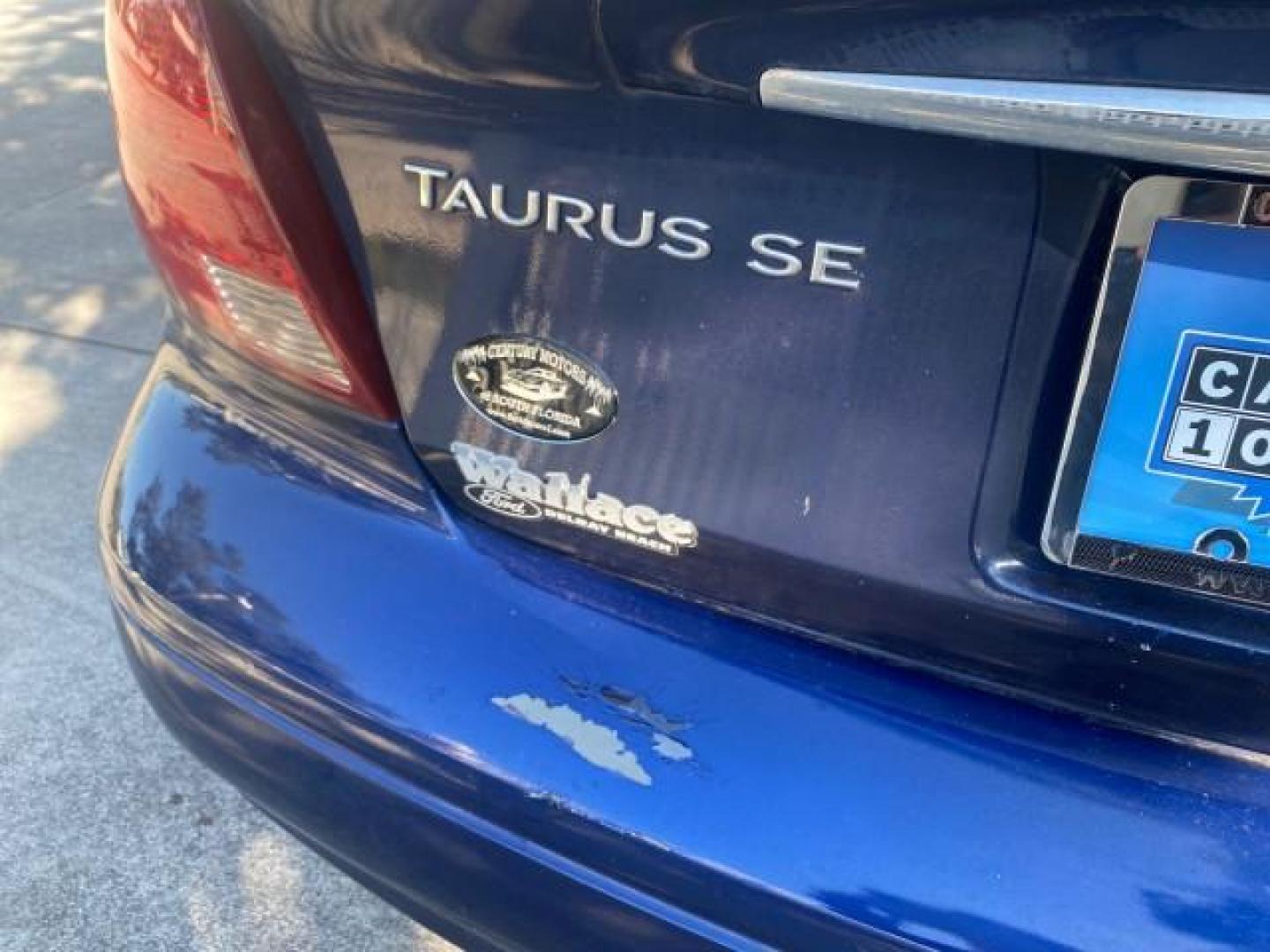 2000 Medium Royal Blue Metallic /Medium Graphite Ford Taurus SEL (1FAFP56S0YA) with an 3.0L DOHC SMPI 24-Valve V6 Duratec Engine engine, Automatic transmission, located at 4701 North Dixie Hwy, Pompano Beach, FL, 33064, (954) 422-2889, 26.240938, -80.123474 - OUR WEBPAGE FLORIDACARS1.COM HAS OVER 100 PHOTOS AND FREE CARFAX LINK 2000 FORD TAURUS SEL VIN: 1FAFP56S0YA125006 1 F A F P 5 6 S 0 Y A 1 2 5 0 0 6 SEDAN 4 DR 3.0L V6 F DOHC 24V GASOLINE 28 MPG FRONT WHEEL DRIVE Features ABS Brakes Air Conditioning Alloy Wheels AM/FM Stereo Automatic Transmission Au - Photo#85