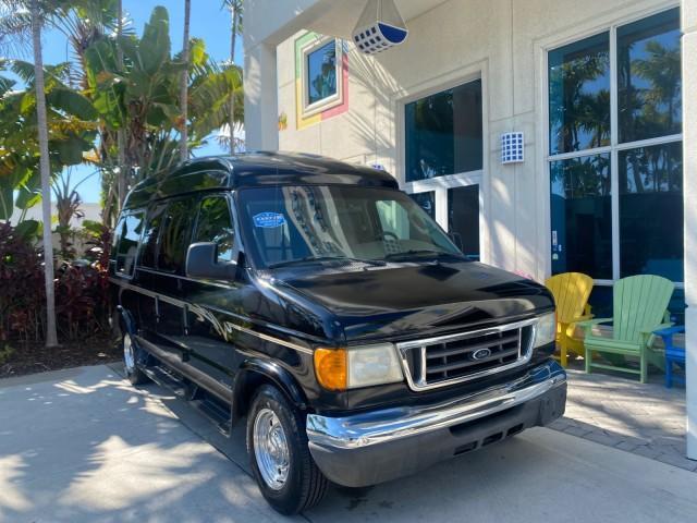 2006 Black /Medium Pebble Ford Econoline HI TOP E250 EXPLORER CONVERSION HANDICAP (1FDNE24L26H) with an 5.4L SOHC EFI V8 Triton Engine engine, Automatic transmission, located at 4701 North Dixie Hwy, Pompano Beach, FL, 33064, (954) 422-2889, 26.240938, -80.123474 - OUR WEBPAGE FLORIDACARS1.COM HAS OVER 100 PHOTOS AND FREE CARFAX LINK 2006 FORD ECONOLINE E250 EXPLORER CONVERSION HANDICAP $90,000 NEW VIN: 1FDNE24L26HA32770 1 F D N E 2 4 L 2 6 H A 3 2 7 7 0 VAN 5.4L V8 F GASOLINE REAR WHEEL DRIVE Features ABS Brakes Air Conditioning Alloy Wheels AM/FM Stereo Auto - Photo#1