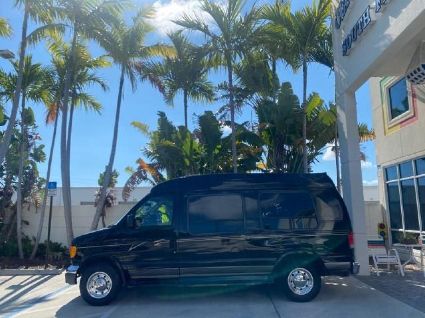 2006 Black /Medium Pebble Ford Econoline HI TOP E250 EXPLORER CONVERSION HANDICAP (1FDNE24L26H) with an 5.4L SOHC EFI V8 Triton Engine engine, Automatic transmission, located at 4701 North Dixie Hwy, Pompano Beach, FL, 33064, (954) 422-2889, 26.240938, -80.123474 - OUR WEBPAGE FLORIDACARS1.COM HAS OVER 100 PHOTOS AND FREE CARFAX LINK 2006 FORD ECONOLINE E250 EXPLORER CONVERSION HANDICAP $90,000 NEW VIN: 1FDNE24L26HA32770 1 F D N E 2 4 L 2 6 H A 3 2 7 7 0 VAN 5.4L V8 F GASOLINE REAR WHEEL DRIVE Features ABS Brakes Air Conditioning Alloy Wheels AM/FM Stereo Auto - Photo#4