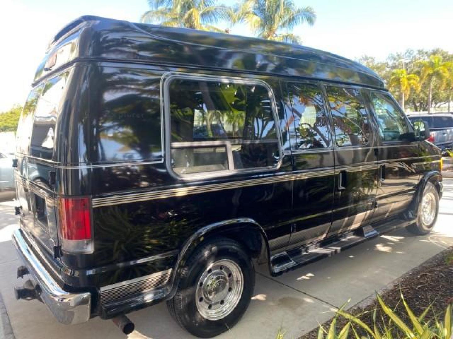 2006 Black /Medium Pebble Ford Econoline HI TOP E250 EXPLORER CONVERSION HANDICAP (1FDNE24L26H) with an 5.4L SOHC EFI V8 Triton Engine engine, Automatic transmission, located at 4701 North Dixie Hwy, Pompano Beach, FL, 33064, (954) 422-2889, 26.240938, -80.123474 - OUR WEBPAGE FLORIDACARS1.COM HAS OVER 100 PHOTOS AND FREE CARFAX LINK 2006 FORD ECONOLINE E250 EXPLORER CONVERSION HANDICAP $90,000 NEW VIN: 1FDNE24L26HA32770 1 F D N E 2 4 L 2 6 H A 3 2 7 7 0 VAN 5.4L V8 F GASOLINE REAR WHEEL DRIVE Features ABS Brakes Air Conditioning Alloy Wheels AM/FM Stereo Auto - Photo#7