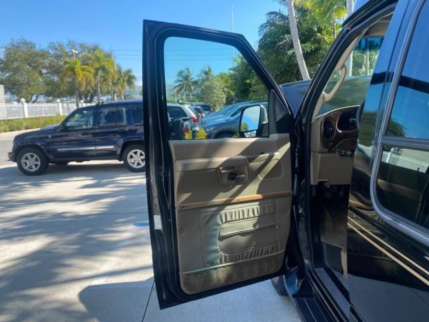 2006 Black /Medium Pebble Ford Econoline HI TOP E250 EXPLORER CONVERSION HANDICAP (1FDNE24L26H) with an 5.4L SOHC EFI V8 Triton Engine engine, Automatic transmission, located at 4701 North Dixie Hwy, Pompano Beach, FL, 33064, (954) 422-2889, 26.240938, -80.123474 - OUR WEBPAGE FLORIDACARS1.COM HAS OVER 100 PHOTOS AND FREE CARFAX LINK 2006 FORD ECONOLINE E250 EXPLORER CONVERSION HANDICAP $90,000 NEW VIN: 1FDNE24L26HA32770 1 F D N E 2 4 L 2 6 H A 3 2 7 7 0 VAN 5.4L V8 F GASOLINE REAR WHEEL DRIVE Features ABS Brakes Air Conditioning Alloy Wheels AM/FM Stereo Auto - Photo#9