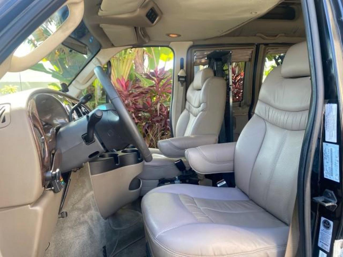 2006 Black /Medium Pebble Ford Econoline HI TOP E250 EXPLORER CONVERSION HANDICAP (1FDNE24L26H) with an 5.4L SOHC EFI V8 Triton Engine engine, Automatic transmission, located at 4701 North Dixie Hwy, Pompano Beach, FL, 33064, (954) 422-2889, 26.240938, -80.123474 - OUR WEBPAGE FLORIDACARS1.COM HAS OVER 100 PHOTOS AND FREE CARFAX LINK 2006 FORD ECONOLINE E250 EXPLORER CONVERSION HANDICAP $90,000 NEW VIN: 1FDNE24L26HA32770 1 F D N E 2 4 L 2 6 H A 3 2 7 7 0 VAN 5.4L V8 F GASOLINE REAR WHEEL DRIVE Features ABS Brakes Air Conditioning Alloy Wheels AM/FM Stereo Auto - Photo#10