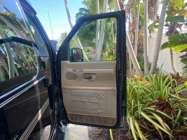 2006 Black /Medium Pebble Ford Econoline HI TOP E250 EXPLORER CONVERSION HANDICAP (1FDNE24L26H) with an 5.4L SOHC EFI V8 Triton Engine engine, Automatic transmission, located at 4701 North Dixie Hwy, Pompano Beach, FL, 33064, (954) 422-2889, 26.240938, -80.123474 - OUR WEBPAGE FLORIDACARS1.COM HAS OVER 100 PHOTOS AND FREE CARFAX LINK 2006 FORD ECONOLINE E250 EXPLORER CONVERSION HANDICAP $90,000 NEW VIN: 1FDNE24L26HA32770 1 F D N E 2 4 L 2 6 H A 3 2 7 7 0 VAN 5.4L V8 F GASOLINE REAR WHEEL DRIVE Features ABS Brakes Air Conditioning Alloy Wheels AM/FM Stereo Auto - Photo#11