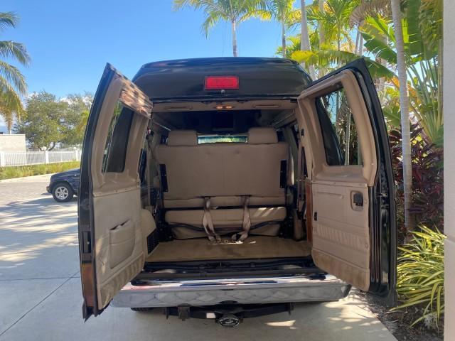 2006 Black /Medium Pebble Ford Econoline HI TOP E250 EXPLORER CONVERSION HANDICAP (1FDNE24L26H) with an 5.4L SOHC EFI V8 Triton Engine engine, Automatic transmission, located at 4701 North Dixie Hwy, Pompano Beach, FL, 33064, (954) 422-2889, 26.240938, -80.123474 - OUR WEBPAGE FLORIDACARS1.COM HAS OVER 100 PHOTOS AND FREE CARFAX LINK 2006 FORD ECONOLINE E250 EXPLORER CONVERSION HANDICAP $90,000 NEW VIN: 1FDNE24L26HA32770 1 F D N E 2 4 L 2 6 H A 3 2 7 7 0 VAN 5.4L V8 F GASOLINE REAR WHEEL DRIVE Features ABS Brakes Air Conditioning Alloy Wheels AM/FM Stereo Auto - Photo#15
