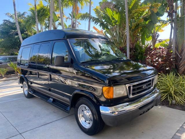 2006 Black /Medium Pebble Ford Econoline HI TOP E250 EXPLORER CONVERSION HANDICAP (1FDNE24L26H) with an 5.4L SOHC EFI V8 Triton Engine engine, Automatic transmission, located at 4701 North Dixie Hwy, Pompano Beach, FL, 33064, (954) 422-2889, 26.240938, -80.123474 - OUR WEBPAGE FLORIDACARS1.COM HAS OVER 100 PHOTOS AND FREE CARFAX LINK 2006 FORD ECONOLINE E250 EXPLORER CONVERSION HANDICAP $90,000 NEW VIN: 1FDNE24L26HA32770 1 F D N E 2 4 L 2 6 H A 3 2 7 7 0 VAN 5.4L V8 F GASOLINE REAR WHEEL DRIVE Features ABS Brakes Air Conditioning Alloy Wheels AM/FM Stereo Auto - Photo#24